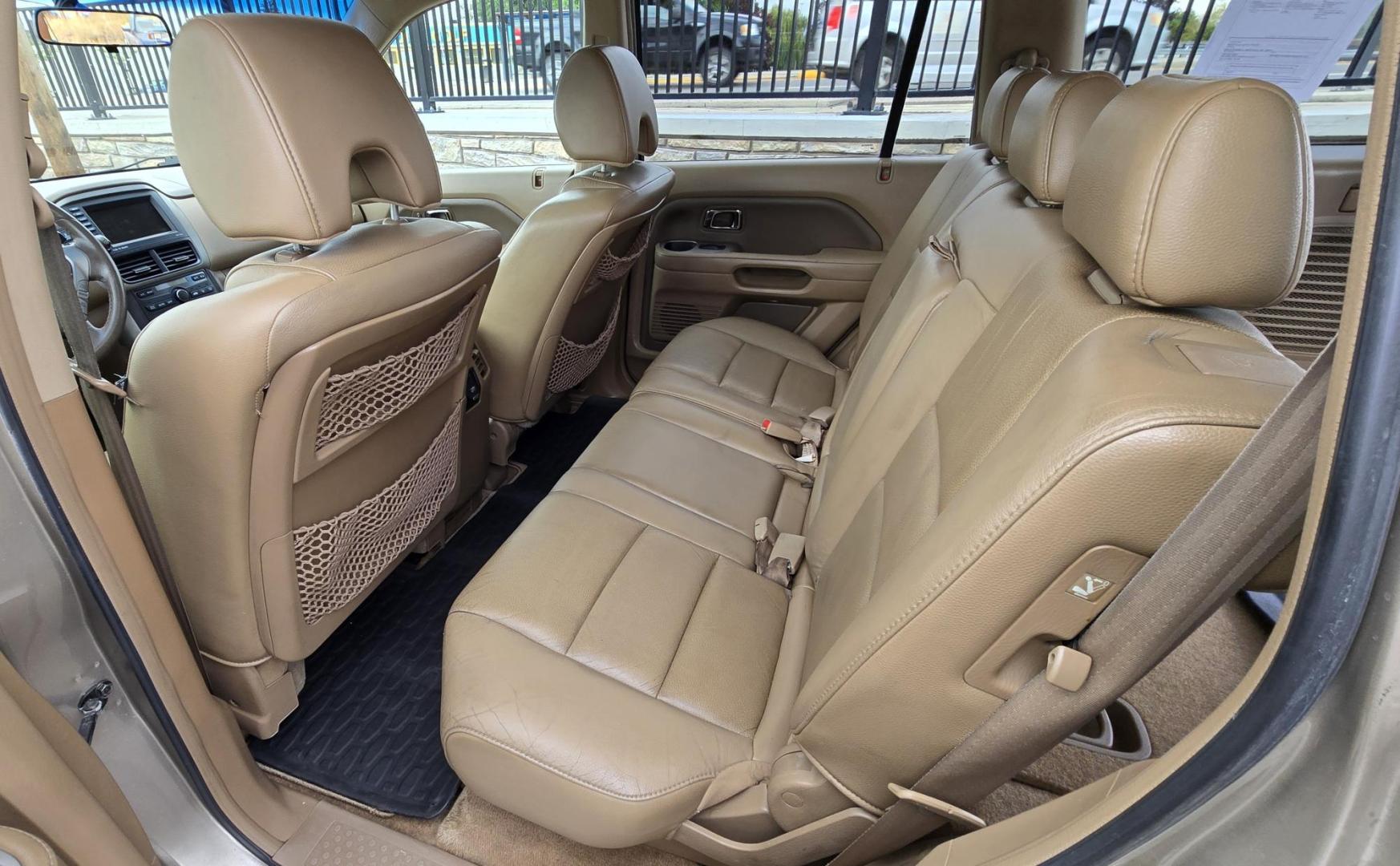 2006 Gold /Tan Honda Pilot EX 4WD w/Leather and Navigation (2HKYF18726H) with an 3.5L V6 SOHC 24V engine, 5-Speed Automatic Overdrive transmission, located at 450 N Russell, Missoula, MT, 59801, (406) 543-6600, 46.874496, -114.017433 - One Owner Honda Pilot AWD. 3.5L V6 Engine. Leather Heated Front Seats. 3rd Row Seating. Power Sun Roof. Power Windows and Locks. Air. Cruise. Tilt. Navigation. Bluetooth. Backup Camera. AM FM XM CD Changer. Timing Belt was Replaced at 120K We Finance through local Credit Unions. We do NOT off - Photo#14