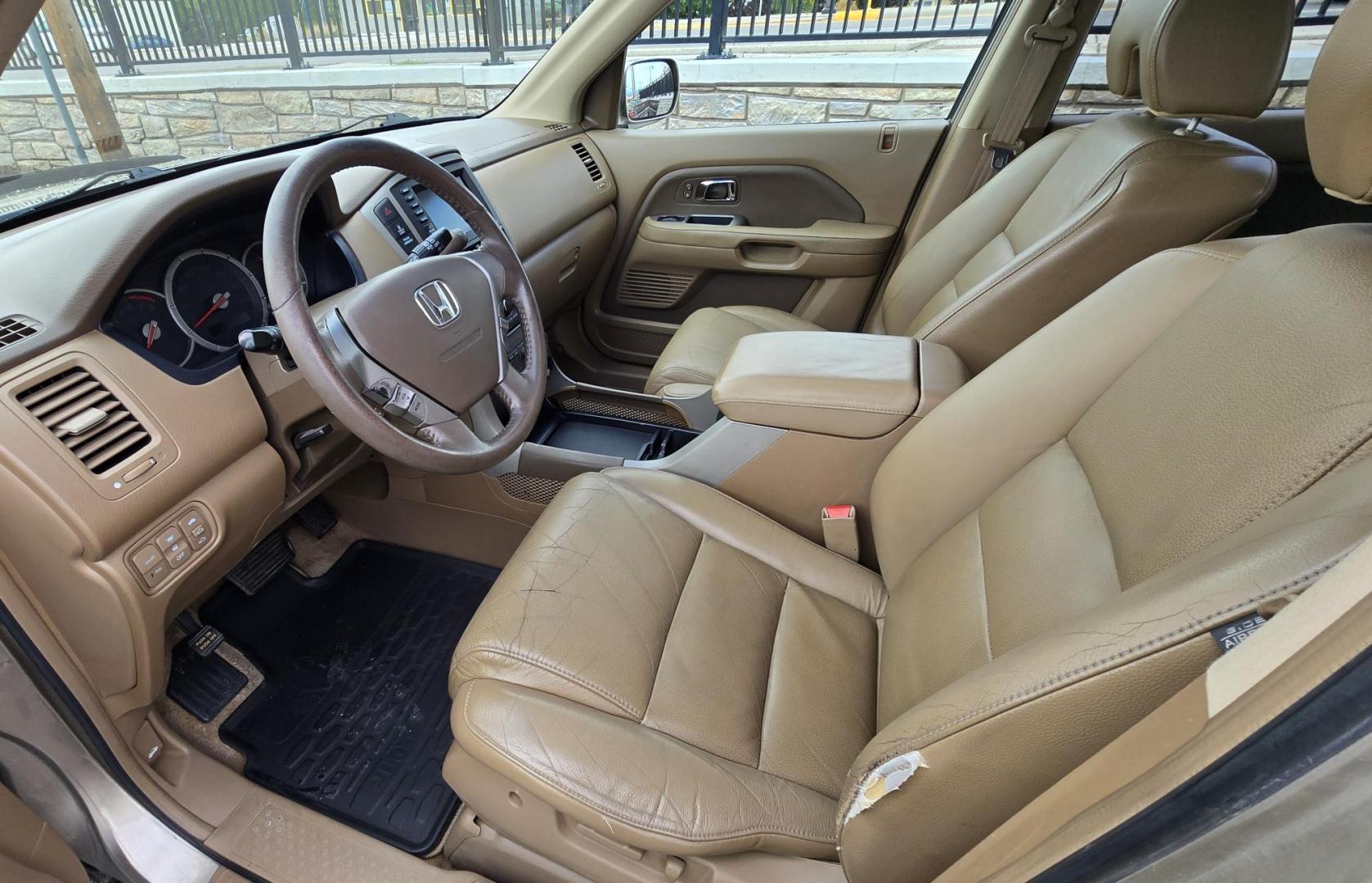 2006 Gold /Tan Honda Pilot EX 4WD w/Leather and Navigation (2HKYF18726H) with an 3.5L V6 SOHC 24V engine, 5-Speed Automatic Overdrive transmission, located at 450 N Russell, Missoula, MT, 59801, (406) 543-6600, 46.874496, -114.017433 - One Owner Honda Pilot AWD. 3.5L V6 Engine. Leather Heated Front Seats. 3rd Row Seating. Power Sun Roof. Power Windows and Locks. Air. Cruise. Tilt. Navigation. Bluetooth. Backup Camera. AM FM XM CD Changer. Timing Belt was Replaced at 120K We Finance through local Credit Unions. We do NOT off - Photo#15