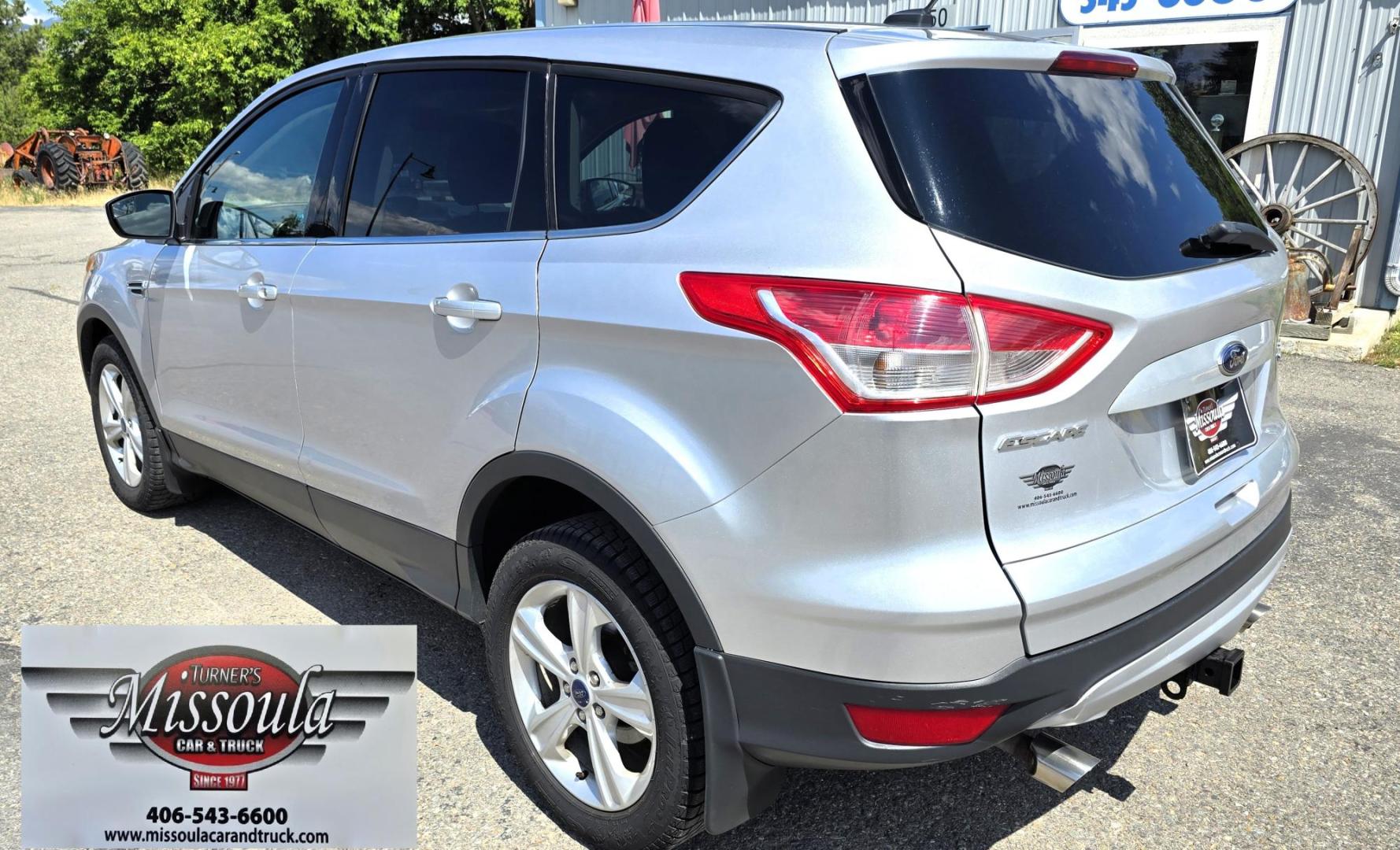 2014 Silver /Gray Ford Escape SE 4WD (1FMCU9G93EU) with an 2.0L L4 DOHC 16V engine, 6-Speed Automatic transmission, located at 450 N Russell, Missoula, MT, 59801, (406) 543-6600, 46.874496, -114.017433 - Affordable AWD SUV. Economical 2.0L I4 Engine. 6 Speed Automatic Transmission. Air. Cruise. Tilt. Power Windows and Locks. AM FM CD Player. Bluetooth Audio and Phone. Backup Camera. Towing. We Finance through local Credit Unions. We do NOT offer In House (Buy Here Pay Here) Financing. - Photo#3