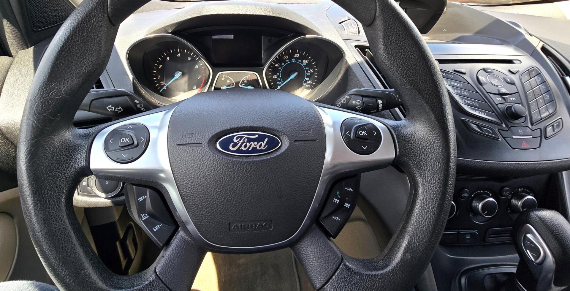 2014 Silver /Gray Ford Escape SE 4WD (1FMCU9G93EU) with an 2.0L L4 DOHC 16V engine, 6-Speed Automatic transmission, located at 450 N Russell, Missoula, MT, 59801, (406) 543-6600, 46.874496, -114.017433 - Affordable AWD SUV. Economical 2.0L I4 Engine. 6 Speed Automatic Transmission. Air. Cruise. Tilt. Power Windows and Locks. AM FM CD Player. Bluetooth Audio and Phone. Backup Camera. Towing. We Finance through local Credit Unions. We do NOT offer In House (Buy Here Pay Here) Financing. - Photo#13