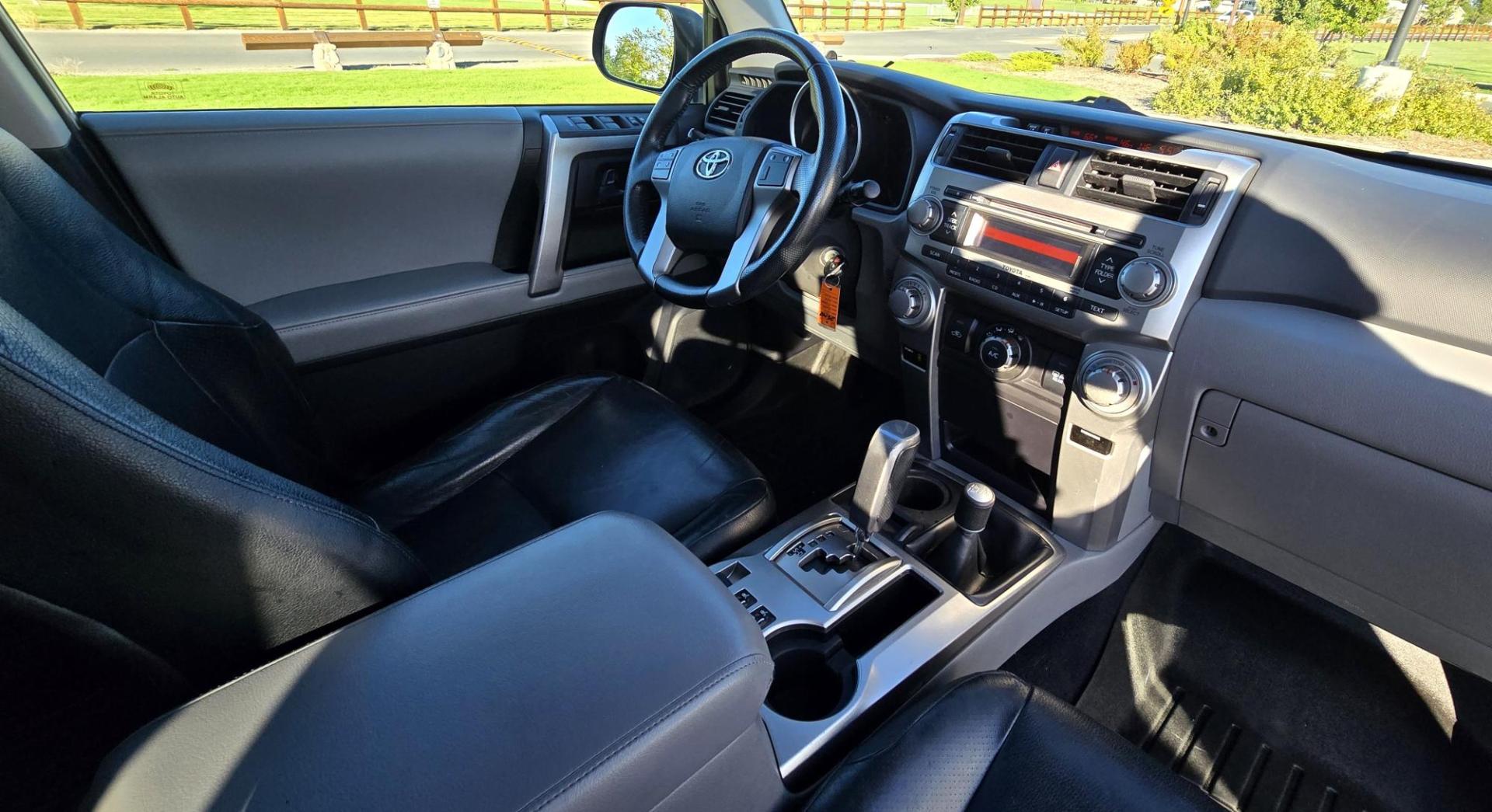 2011 Silver /Black Toyota 4Runner SR5 4WD V6 (JTEBU5JRXB5) with an 4.0L V6 DOHC 24V engine, 5-Speed Automatic transmission, located at 450 N Russell, Missoula, MT, 59801, (406) 543-6600, 46.874496, -114.017433 - Nice 2 Owner 4WD SUV. The Toyota 4Runner is one of the most sought after vehicles on Montana today. Rugged and Comfortable. 4.0L V6 Engine. Automatic Transmission. Leather Interior. Power Heated Front Seats. Power Sunroof. Bluetooth Audio and Phone. AM FM CD Player. Air. Cruise. Tilt. Power Windows - Photo#13