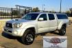 2011 Silver /Gray Toyota Tacoma Double Cab Long Bed V6 Auto 4WD (3TMMU4FN7BM) with an 4.0L V6 DOHC 24V engine, 5-Speed Automatic transmission, located at 450 N Russell, Missoula, MT, 59801, (406) 543-6600, 46.874496, -114.017433 - Hard to Find Tacoma 4WD with Matching Leer Topper. 4.0L V6 Engine. Automatic Transmission. Air. Cruise. Tilt. Power Windows and Locks. AM FM CD Player with Bluetooth Audio and Phone. Comes with two sets of Tires and Wheels. The second set is studded snow tires. Running Boards. Towing. Yes, it has a - Photo#4