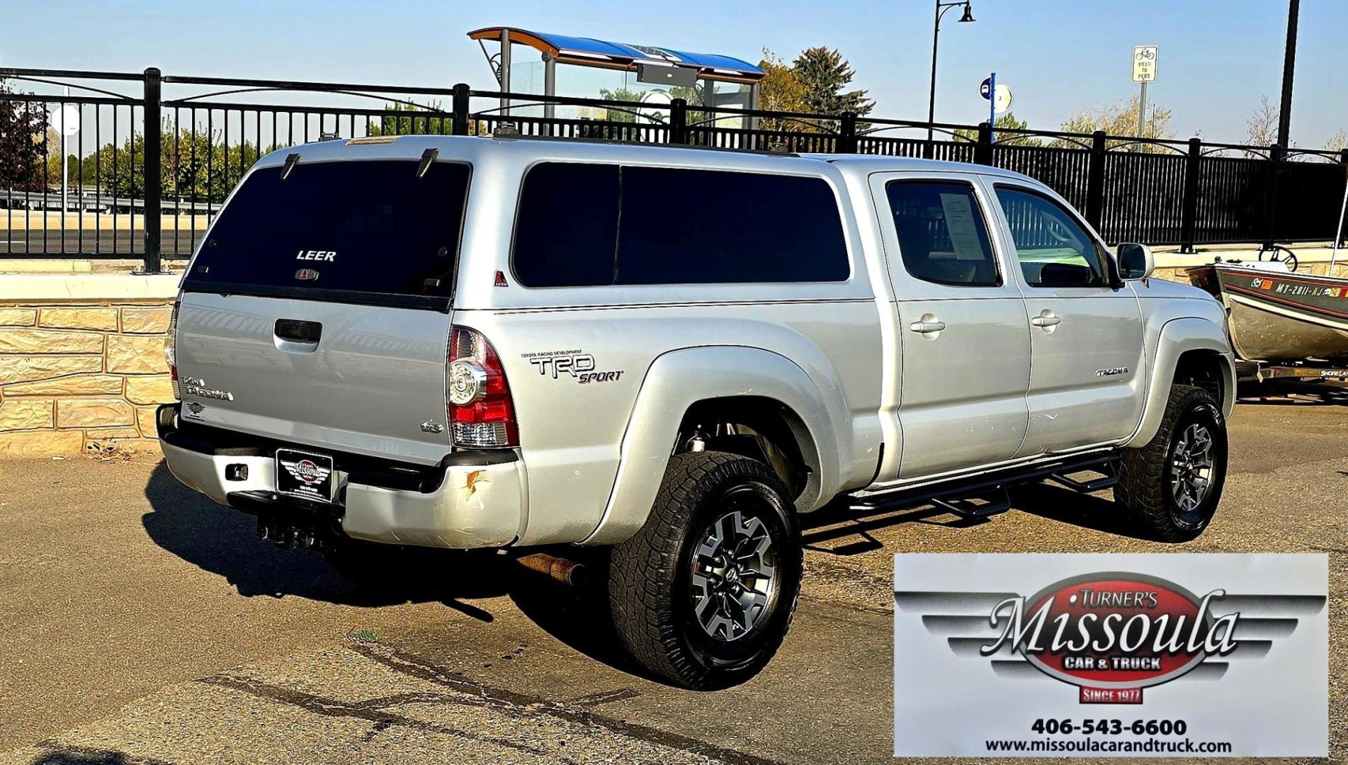 2011 Silver /Gray Toyota Tacoma Double Cab Long Bed V6 Auto 4WD (3TMMU4FN7BM) with an 4.0L V6 DOHC 24V engine, 5-Speed Automatic transmission, located at 450 N Russell, Missoula, MT, 59801, (406) 543-6600, 46.874496, -114.017433 - Hard to Find Tacoma 4WD with Matching Leer Topper. 4.0L V6 Engine. Automatic Transmission. Air. Cruise. Tilt. Power Windows and Locks. AM FM CD Player with Bluetooth Audio and Phone. Comes with two sets of Tires and Wheels. The second set is studded snow tires. Running Boards. Towing. Yes, it has a - Photo#8
