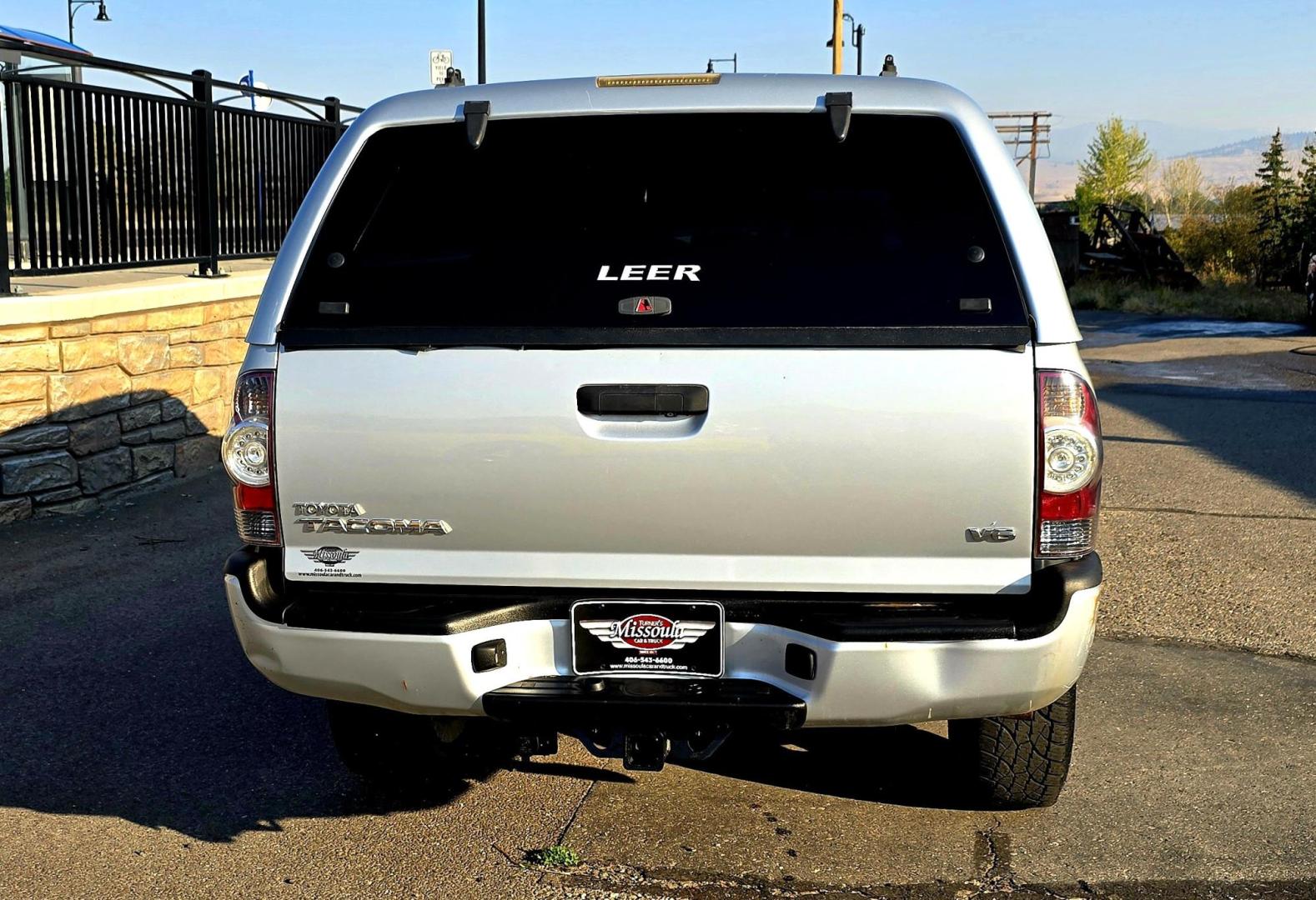 2011 Silver /Gray Toyota Tacoma Double Cab Long Bed V6 Auto 4WD (3TMMU4FN7BM) with an 4.0L V6 DOHC 24V engine, 5-Speed Automatic transmission, located at 450 N Russell, Missoula, MT, 59801, (406) 543-6600, 46.874496, -114.017433 - Hard to Find Tacoma 4WD with Matching Leer Topper. 4.0L V6 Engine. Automatic Transmission. Air. Cruise. Tilt. Power Windows and Locks. AM FM CD Player with Bluetooth Audio and Phone. Comes with two sets of Tires and Wheels. The second set is studded snow tires. Running Boards. Towing. Yes, it has a - Photo#12