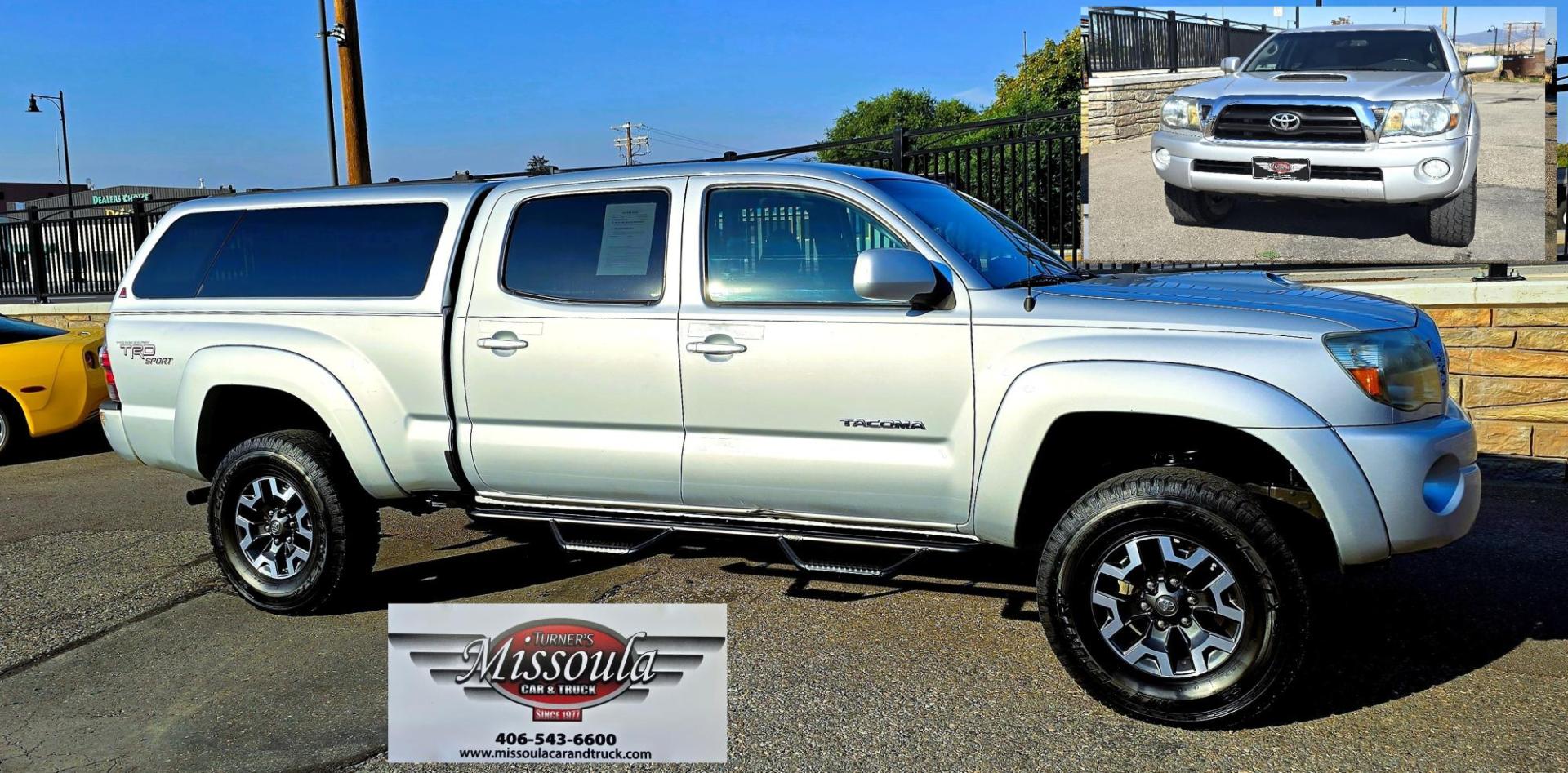 2011 Silver /Gray Toyota Tacoma Double Cab Long Bed V6 Auto 4WD (3TMMU4FN7BM) with an 4.0L V6 DOHC 24V engine, 5-Speed Automatic transmission, located at 450 N Russell, Missoula, MT, 59801, (406) 543-6600, 46.874496, -114.017433 - Hard to Find Tacoma 4WD with Matching Leer Topper. 4.0L V6 Engine. Automatic Transmission. Air. Cruise. Tilt. Power Windows and Locks. AM FM CD Player with Bluetooth Audio and Phone. Comes with two sets of Tires and Wheels. The second set is studded snow tires. Running Boards. Towing. Yes, it has a - Photo#1