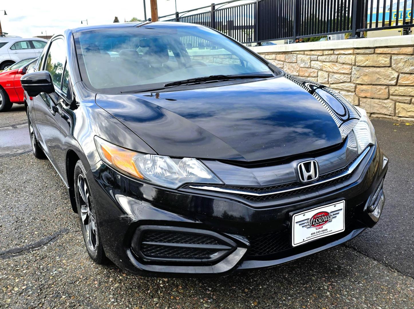 2015 Black /Black Honda Civic EX Coupe CVT (2HGFG3B80FH) with an 2.3L L4 SOHC 16V engine, Automatic transmission, located at 450 N Russell, Missoula, MT, 59801, (406) 543-6600, 46.874496, -114.017433 - Sporty with great Fuel Economy FWD Coupe. 1.8L Engine. Automatic Transmission with the ability to also shift with the steering wheel paddle shifter. Power Sun Roof. Power Windows and Locks. Air. Cruise. Tilt. AM FM SAT. Bluetooth Audio and Phone. Backup Camera. Right Turn Camera. 2 Owner. - Photo#10