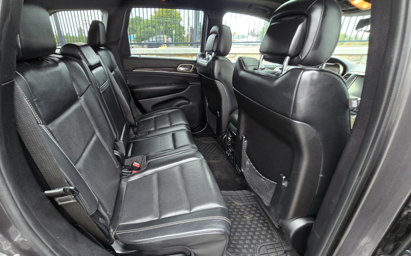 2015 Grey /Black Jeep Grand Cherokee Overland 4WD (1C4RJFCGXFC) with an 3.6L V6 DOHC 24V engine, 8-Speed Automatic transmission, located at 450 N Russell, Missoula, MT, 59801, (406) 543-6600, 46.874496, -114.017433 - Clean 4WD SUV. Peppy 3.6L V6 Engine. 8 Speed Automatic Transmission this Paddle Shifters for Manual Shifting. Huge Panoramic Sun Roof. Front and Rear Heated Seats. Heated Steering Wheel. Vented Front Seats for Cooling. AM FM SAT. Bluetooth Audio and Phone. Navigation. Backup Camera. Remote Start. Po - Photo#11