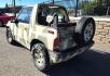 1993 Camo Geo Tracker 2-Door 4WD (2CNBJ18U7P6) with an 1.6L L4 SOHC 8V engine, 4 Speed Manual transmission, located at 450 N Russell, Missoula, MT, 59801, (406) 543-6600, 46.874496, -114.017433 - One Owner with only 34K Miles. Not the prettiest but runs amazing. Owner bought it to keep at his cabin it it has very little use. Somewhere along the way he lost the top to it. 1.6L I4 Engine. 4 Speed Manual Transmission. 4WD. Seats Five. More comfortable than an ATV with similar attributes. B - Photo#6