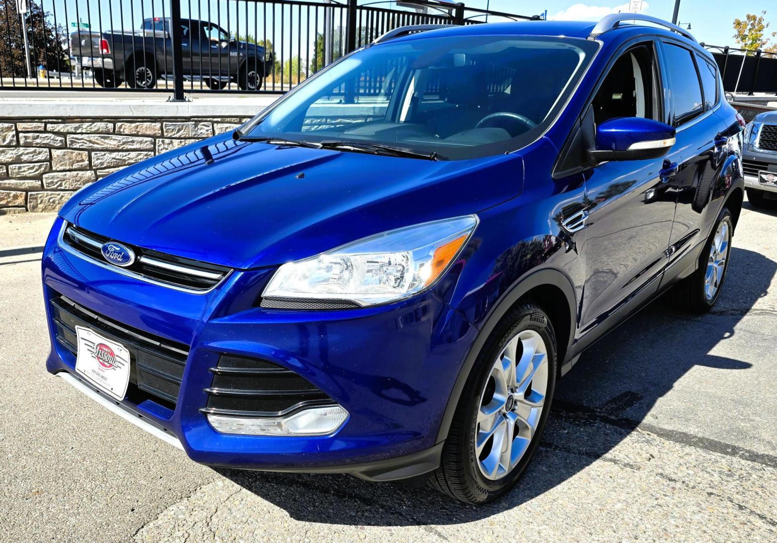2014 Blue /Black Ford Escape Titanium 4WD (1FMCU9J98EU) with an 2.0L L4 DOHC 16V engine, 6-Speed Automatic transmission, located at 450 N Russell, Missoula, MT, 59801, (406) 543-6600, 46.874496, -114.017433 - Clean One Owner AWD SUV. 2.0L I4 EcoBoost Engine. Automatic Transmission. Air. Cruise. Tilt. Power Drivers Seat. Heated Front Seats. AM FM CD Bluetooth. Microsoft Sync Technology. Touchscreen. Navigation. Power Windows and Locks. Backup Camera. Remote Start. Clean Title and Carfax. - Photo#4