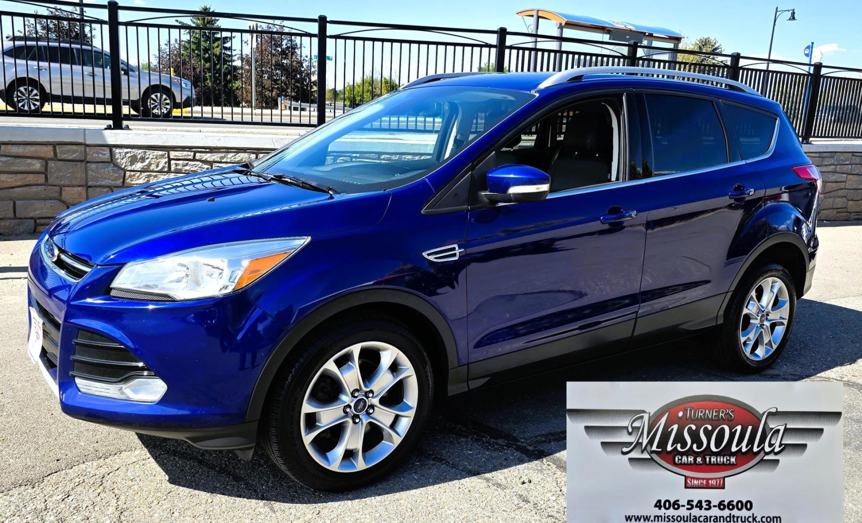 2014 Blue /Black Ford Escape Titanium 4WD (1FMCU9J98EU) with an 2.0L L4 DOHC 16V engine, 6-Speed Automatic transmission, located at 450 N Russell, Missoula, MT, 59801, (406) 543-6600, 46.874496, -114.017433 - Clean One Owner AWD SUV. 2.0L I4 EcoBoost Engine. Automatic Transmission. Air. Cruise. Tilt. Power Drivers Seat. Heated Front Seats. AM FM CD Bluetooth. Microsoft Sync Technology. Touchscreen. Navigation. Power Windows and Locks. Backup Camera. Remote Start. Clean Title and Carfax. - Photo#2
