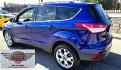 2014 Blue /Black Ford Escape Titanium 4WD (1FMCU9J98EU) with an 2.0L L4 DOHC 16V engine, 6-Speed Automatic transmission, located at 450 N Russell, Missoula, MT, 59801, (406) 543-6600, 46.874496, -114.017433 - Clean One Owner AWD SUV. 2.0L I4 EcoBoost Engine. Automatic Transmission. Air. Cruise. Tilt. Power Drivers Seat. Heated Front Seats. AM FM CD Bluetooth. Microsoft Sync Technology. Touchscreen. Navigation. Power Windows and Locks. Backup Camera. Remote Start. Clean Title and Carfax. - Photo#6