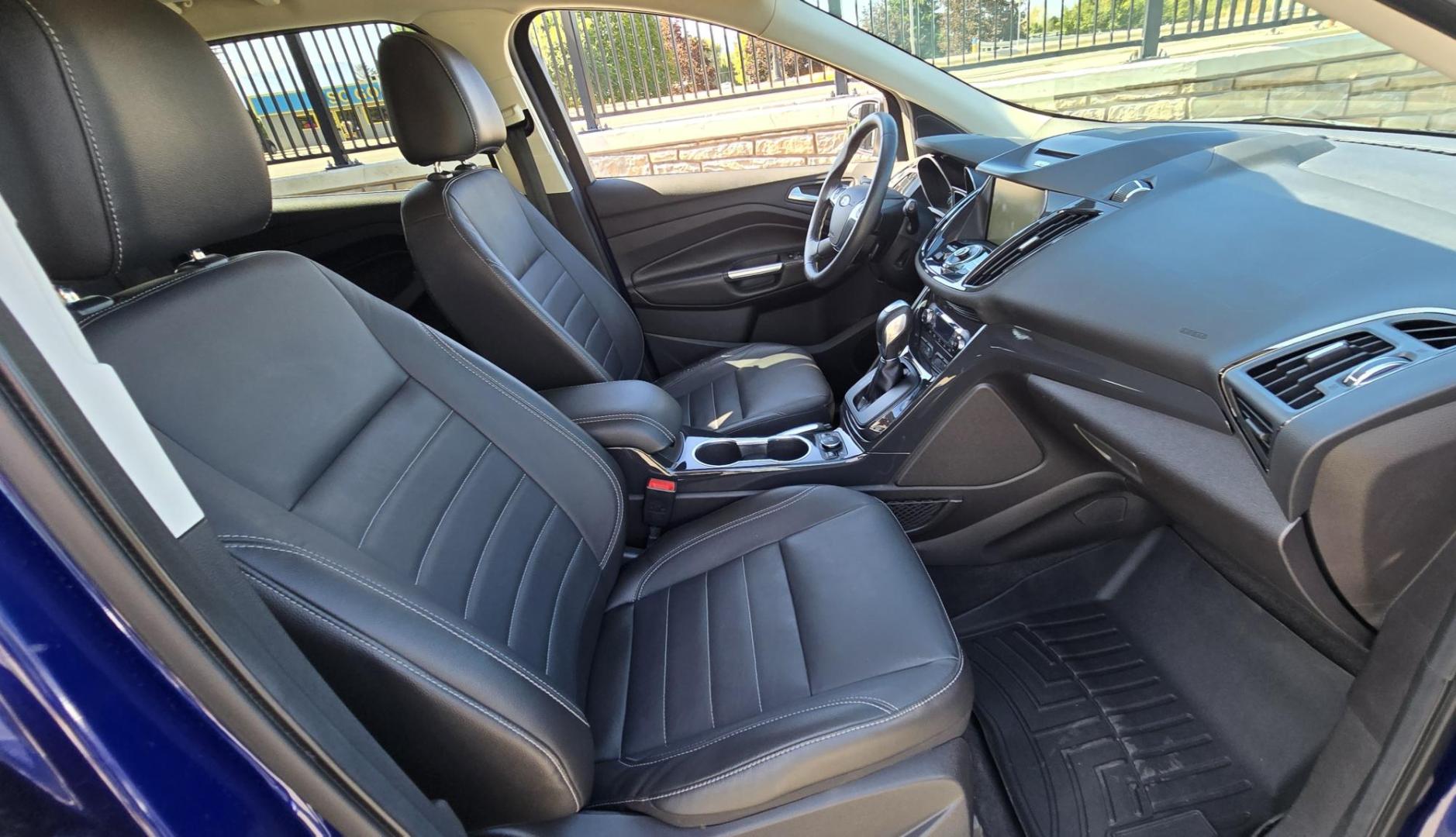2014 Blue /Black Ford Escape Titanium 4WD (1FMCU9J98EU) with an 2.0L L4 DOHC 16V engine, 6-Speed Automatic transmission, located at 450 N Russell, Missoula, MT, 59801, (406) 543-6600, 46.874496, -114.017433 - Clean One Owner AWD SUV. 2.0L I4 EcoBoost Engine. Automatic Transmission. Air. Cruise. Tilt. Power Drivers Seat. Heated Front Seats. AM FM CD Bluetooth. Microsoft Sync Technology. Touchscreen. Navigation. Power Windows and Locks. Backup Camera. Remote Start. Clean Title and Carfax. - Photo#12