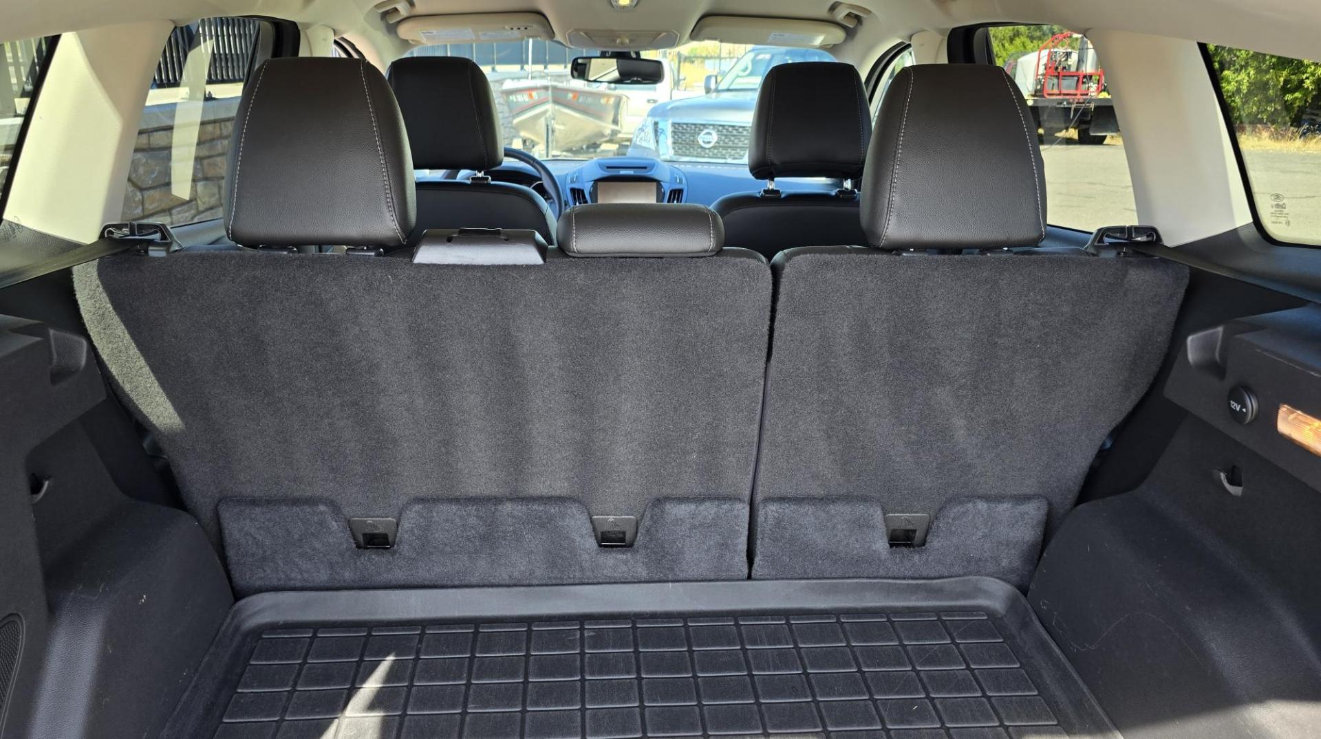 2014 Blue /Black Ford Escape Titanium 4WD (1FMCU9J98EU) with an 2.0L L4 DOHC 16V engine, 6-Speed Automatic transmission, located at 450 N Russell, Missoula, MT, 59801, (406) 543-6600, 46.874496, -114.017433 - Clean One Owner AWD SUV. 2.0L I4 EcoBoost Engine. Automatic Transmission. Air. Cruise. Tilt. Power Drivers Seat. Heated Front Seats. AM FM CD Bluetooth. Microsoft Sync Technology. Touchscreen. Navigation. Power Windows and Locks. Backup Camera. Remote Start. Clean Title and Carfax. - Photo#10