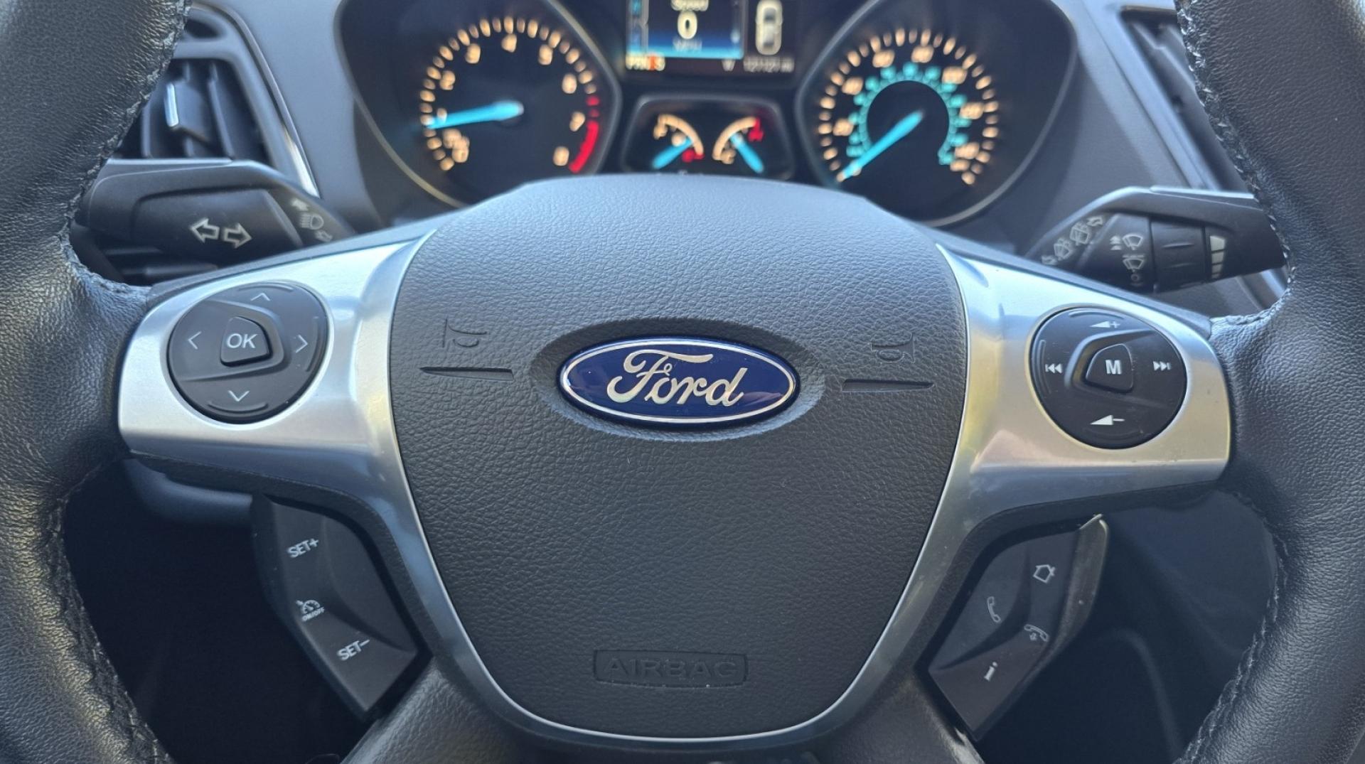 2014 Blue /Black Ford Escape Titanium 4WD (1FMCU9J98EU) with an 2.0L L4 DOHC 16V engine, 6-Speed Automatic transmission, located at 450 N Russell, Missoula, MT, 59801, (406) 543-6600, 46.874496, -114.017433 - Clean One Owner AWD SUV. 2.0L I4 EcoBoost Engine. Automatic Transmission. Air. Cruise. Tilt. Power Drivers Seat. Heated Front Seats. AM FM CD Bluetooth. Microsoft Sync Technology. Touchscreen. Navigation. Power Windows and Locks. Backup Camera. Remote Start. Clean Title and Carfax. - Photo#21