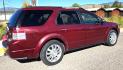 2008 Maroon /Tan Ford Taurus X Limited AWD (1FMDK06W58G) with an 3.5L V6 DOHC 24V engine, 6-Speed Automatic Overdrive transmission, located at 450 N Russell, Missoula, MT, 59801, (406) 543-6600, 46.874496, -114.017433 - AWD SUV High Miles but Runs Amazing. 3.5L V6 Engine. 3rd Row Seating. Rear Entertainment (DVD). Front and Rear Climate Controls. Air. Cruise. Tilt. Bluetooth. AM CM CD Player. Power Heated Front Seats. Hard to Find a AWD with 3rd Row for this Price in such good condition. We Finance through loca - Photo#2