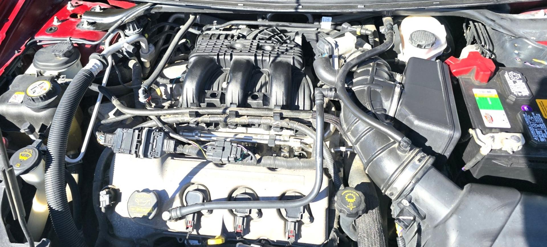 2008 Maroon /Tan Ford Taurus X Limited AWD (1FMDK06W58G) with an 3.5L V6 DOHC 24V engine, 6-Speed Automatic Overdrive transmission, located at 450 N Russell, Missoula, MT, 59801, (406) 543-6600, 46.874496, -114.017433 - AWD SUV High Miles but Runs Amazing. 3.5L V6 Engine. 3rd Row Seating. Rear Entertainment (DVD). Front and Rear Climate Controls. Air. Cruise. Tilt. Bluetooth. AM CM CD Player. Power Heated Front Seats. Hard to Find a AWD with 3rd Row for this Price in such good condition. We Finance through loca - Photo#18
