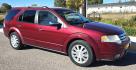 2008 Maroon /Tan Ford Taurus X Limited AWD (1FMDK06W58G) with an 3.5L V6 DOHC 24V engine, 6-Speed Automatic Overdrive transmission, located at 450 N Russell, Missoula, MT, 59801, (406) 543-6600, 46.874496, -114.017433 - AWD SUV High Miles but Runs Amazing. 3.5L V6 Engine. 3rd Row Seating. Rear Entertainment (DVD). Front and Rear Climate Controls. Air. Cruise. Tilt. Bluetooth. AM CM CD Player. Power Heated Front Seats. Hard to Find a AWD with 3rd Row for this Price in such good condition. We Finance through loca - Photo#3