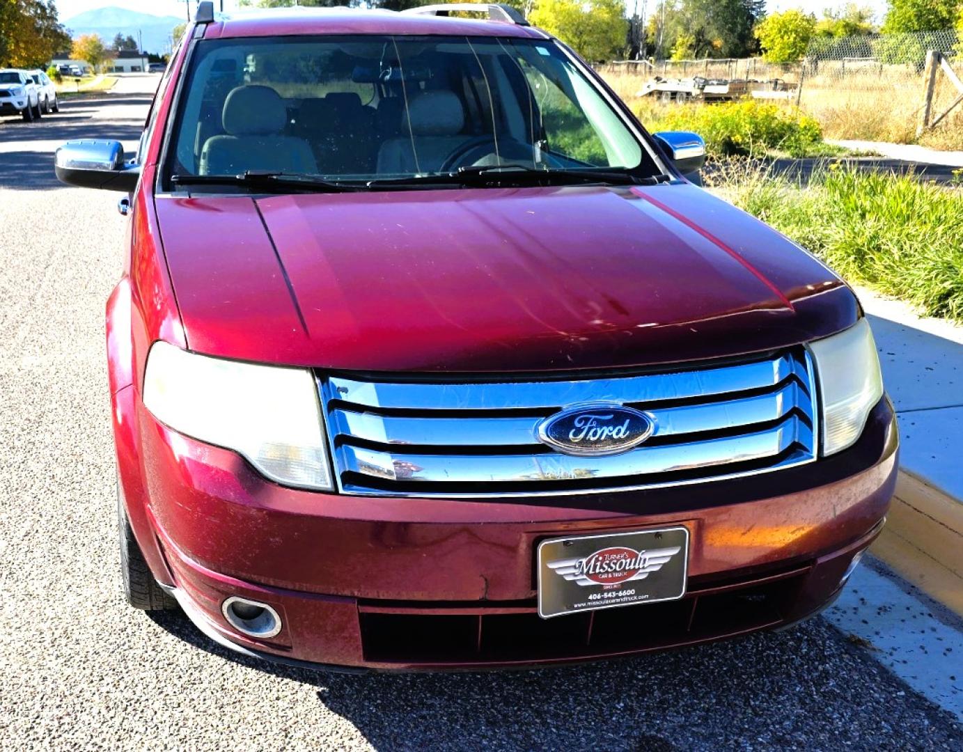 2008 Maroon /Tan Ford Taurus X Limited AWD (1FMDK06W58G) with an 3.5L V6 DOHC 24V engine, 6-Speed Automatic Overdrive transmission, located at 450 N Russell, Missoula, MT, 59801, (406) 543-6600, 46.874496, -114.017433 - AWD SUV High Miles but Runs Amazing. 3.5L V6 Engine. 3rd Row Seating. Rear Entertainment (DVD). Front and Rear Climate Controls. Air. Cruise. Tilt. Bluetooth. AM CM CD Player. Power Heated Front Seats. Hard to Find a AWD with 3rd Row for this Price in such good condition. We Finance through loca - Photo#4