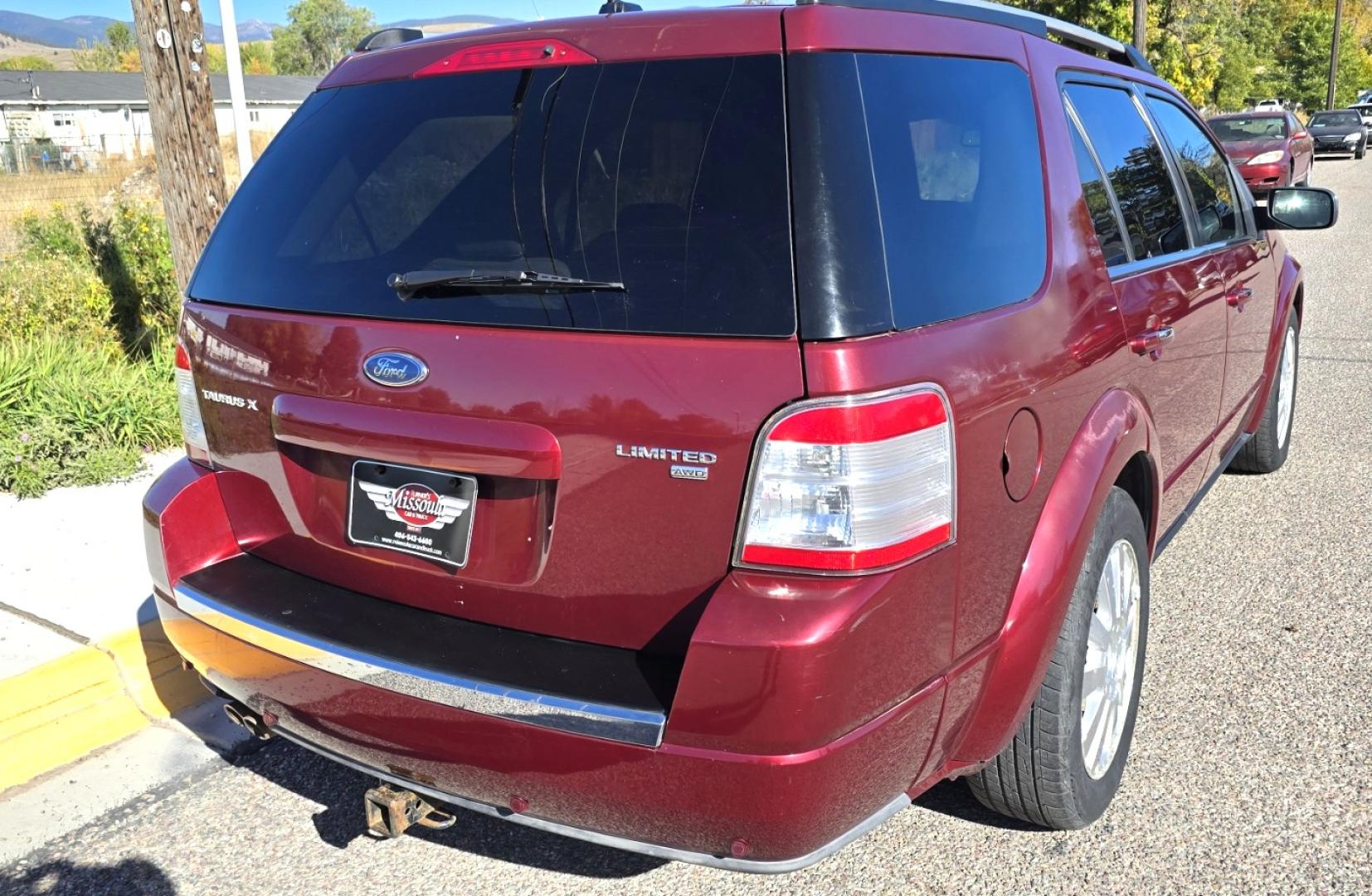 2008 Maroon /Tan Ford Taurus X Limited AWD (1FMDK06W58G) with an 3.5L V6 DOHC 24V engine, 6-Speed Automatic Overdrive transmission, located at 450 N Russell, Missoula, MT, 59801, (406) 543-6600, 46.874496, -114.017433 - AWD SUV High Miles but Runs Amazing. 3.5L V6 Engine. 3rd Row Seating. Rear Entertainment (DVD). Front and Rear Climate Controls. Air. Cruise. Tilt. Bluetooth. AM CM CD Player. Power Heated Front Seats. Hard to Find a AWD with 3rd Row for this Price in such good condition. We Finance through loca - Photo#5