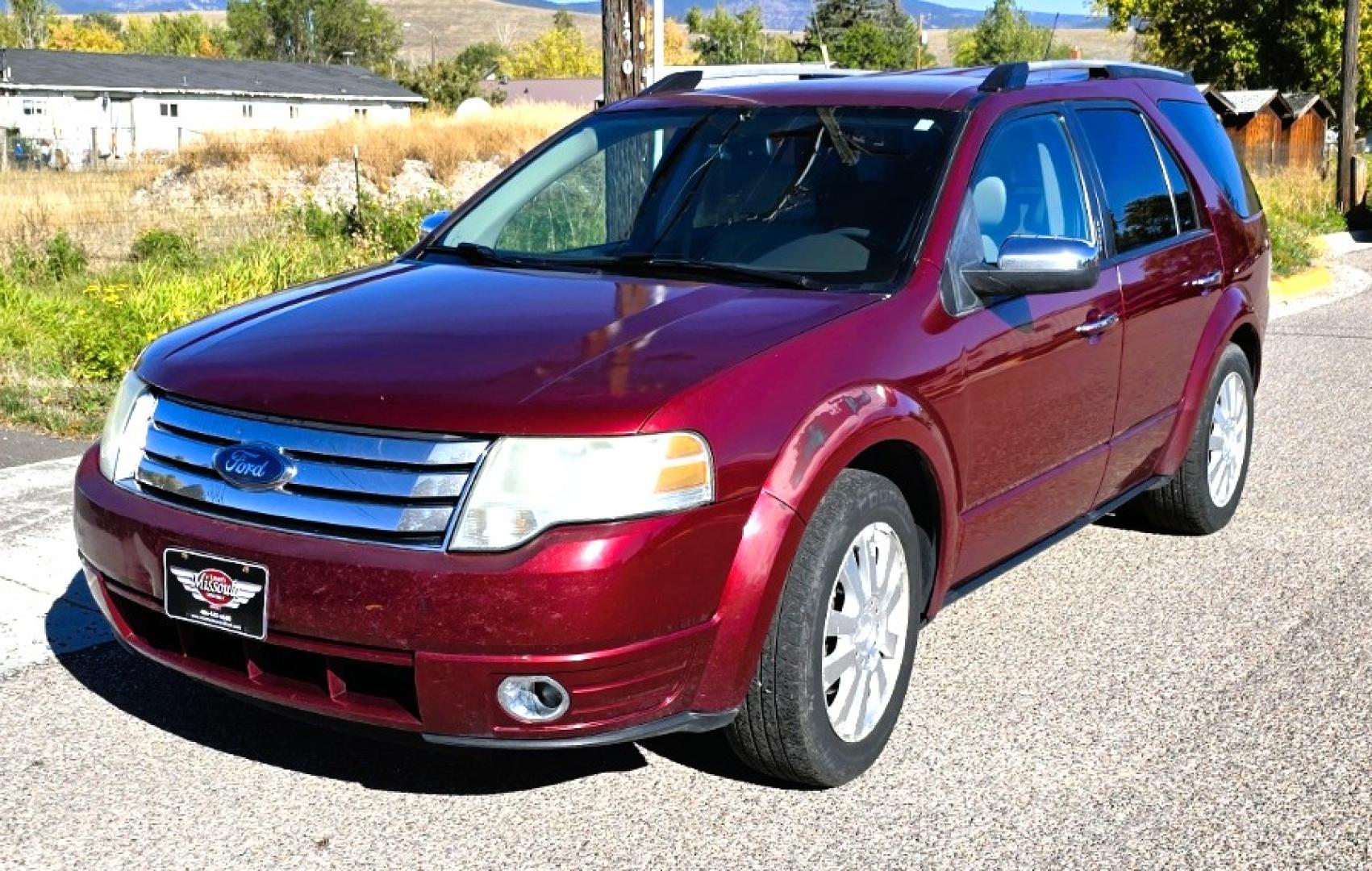2008 Maroon /Tan Ford Taurus X Limited AWD (1FMDK06W58G) with an 3.5L V6 DOHC 24V engine, 6-Speed Automatic Overdrive transmission, located at 450 N Russell, Missoula, MT, 59801, (406) 543-6600, 46.874496, -114.017433 - AWD SUV High Miles but Runs Amazing. 3.5L V6 Engine. 3rd Row Seating. Rear Entertainment (DVD). Front and Rear Climate Controls. Air. Cruise. Tilt. Bluetooth. AM CM CD Player. Power Heated Front Seats. Hard to Find a AWD with 3rd Row for this Price in such good condition. We Finance through loca - Photo#7
