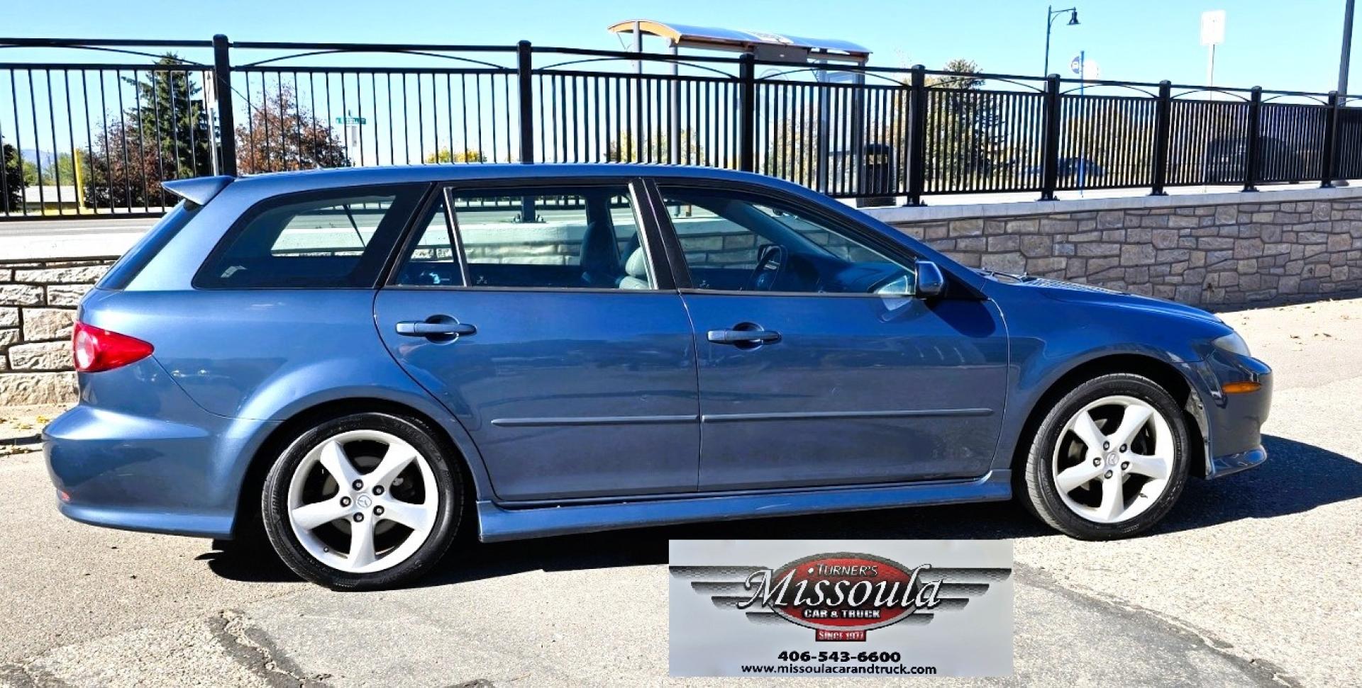 2004 Blue /Tan Mazda MAZDA6 Sport Wagon s (1YVFP82D245) with an 3.0L V6 DOHC 24V engine, 5 Speed Manual transmission, located at 450 N Russell, Missoula, MT, 59801, (406) 543-6600, 46.874496, -114.017433 - Super Clean FWD Wagon. One Owner. Clean Carfax and only 78K Miles. 3.0L V6 Engine. 5 Speed Manual Transmission. Air. Cruise. Tilt. Power Windows and Locks. AM FM CD Player.Power Drivers Seat. Has like New Bridgestone Radials on it and comes with Snow Tires on wheels. Paint is Excellent and Car runs - Photo#0