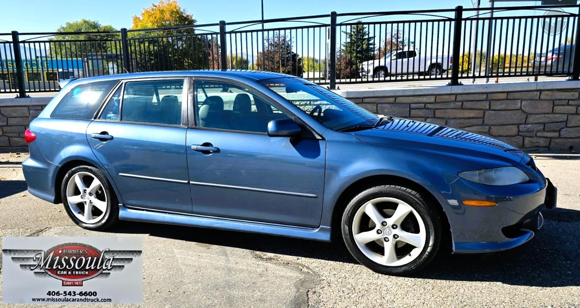 2004 Blue /Tan Mazda MAZDA6 Sport Wagon s (1YVFP82D245) with an 3.0L V6 DOHC 24V engine, 5 Speed Manual transmission, located at 450 N Russell, Missoula, MT, 59801, (406) 543-6600, 46.874496, -114.017433 - Super Clean FWD Wagon. One Owner. Clean Carfax and only 78K Miles. 3.0L V6 Engine. 5 Speed Manual Transmission. Air. Cruise. Tilt. Power Windows and Locks. AM FM CD Player.Power Drivers Seat. Has like New Bridgestone Radials on it and comes with Snow Tires on wheels. Paint is Excellent and Car runs - Photo#1
