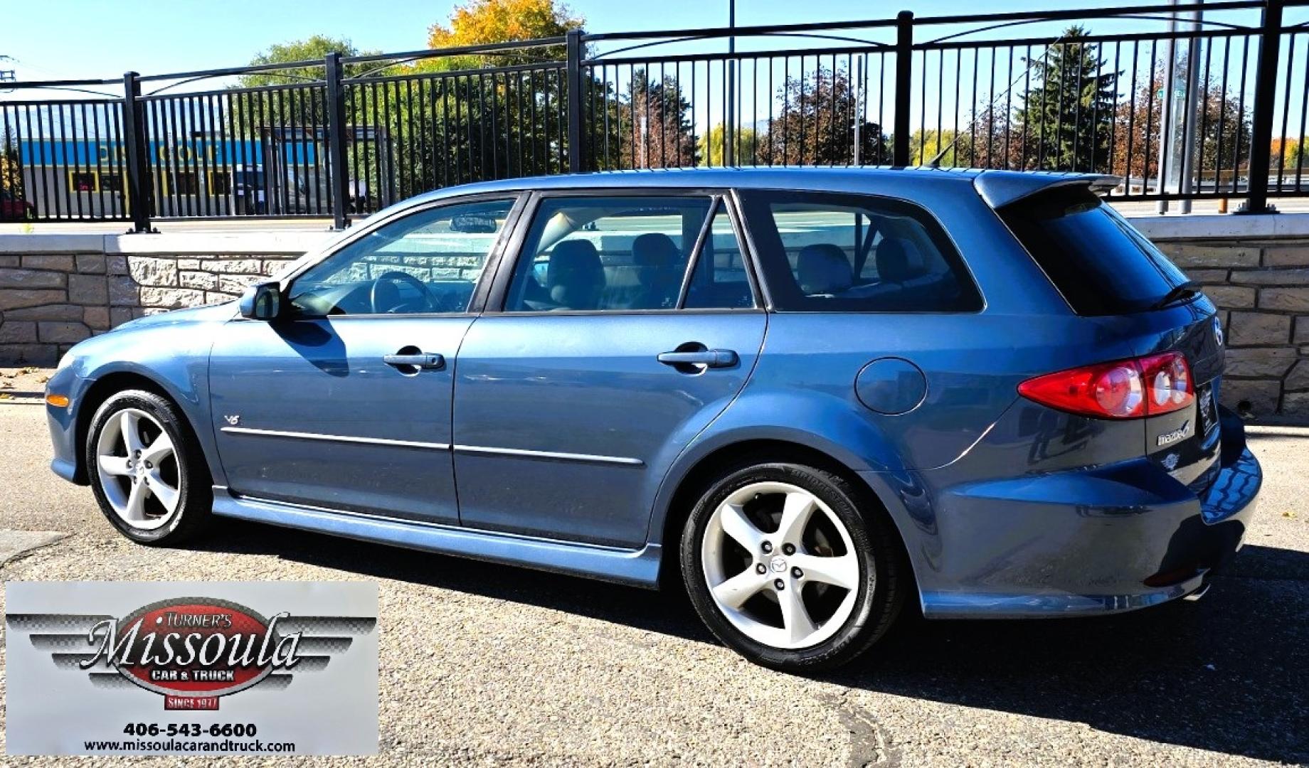 2004 Blue /Tan Mazda MAZDA6 Sport Wagon s (1YVFP82D245) with an 3.0L V6 DOHC 24V engine, 5 Speed Manual transmission, located at 450 N Russell, Missoula, MT, 59801, (406) 543-6600, 46.874496, -114.017433 - Super Clean FWD Wagon. One Owner. Clean Carfax and only 78K Miles. 3.0L V6 Engine. 5 Speed Manual Transmission. Air. Cruise. Tilt. Power Windows and Locks. AM FM CD Player.Power Drivers Seat. Has like New Bridgestone Radials on it and comes with Snow Tires on wheels. Paint is Excellent and Car runs - Photo#5