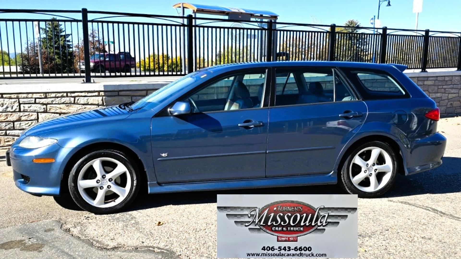 2004 Blue /Tan Mazda MAZDA6 Sport Wagon s (1YVFP82D245) with an 3.0L V6 DOHC 24V engine, 5 Speed Manual transmission, located at 450 N Russell, Missoula, MT, 59801, (406) 543-6600, 46.874496, -114.017433 - Super Clean FWD Wagon. One Owner. Clean Carfax and only 78K Miles. 3.0L V6 Engine. 5 Speed Manual Transmission. Air. Cruise. Tilt. Power Windows and Locks. AM FM CD Player.Power Drivers Seat. Has like New Bridgestone Radials on it and comes with Snow Tires on wheels. Paint is Excellent and Car runs - Photo#4