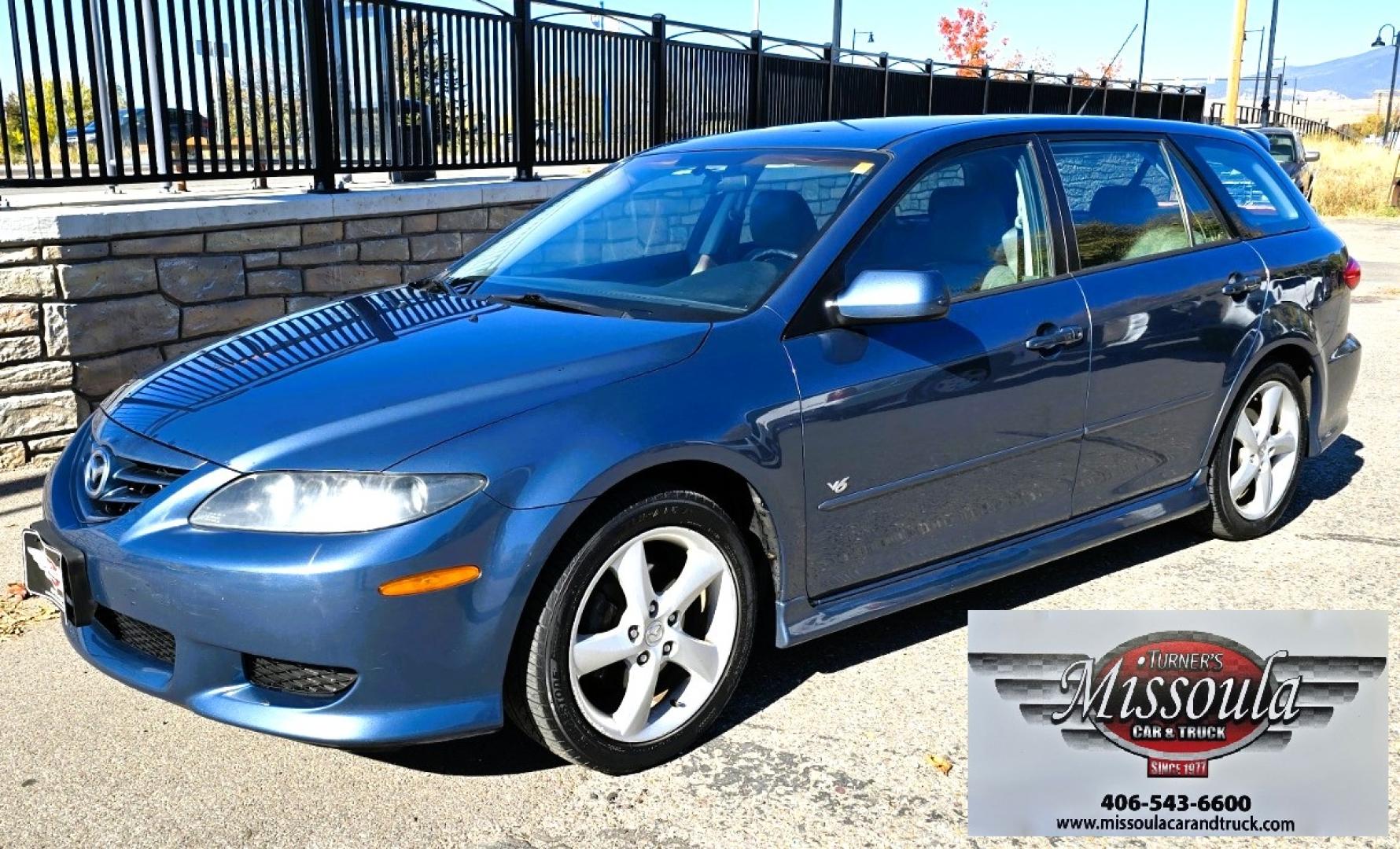 2004 Blue /Tan Mazda MAZDA6 Sport Wagon s (1YVFP82D245) with an 3.0L V6 DOHC 24V engine, 5 Speed Manual transmission, located at 450 N Russell, Missoula, MT, 59801, (406) 543-6600, 46.874496, -114.017433 - Super Clean FWD Wagon. One Owner. Clean Carfax and only 78K Miles. 3.0L V6 Engine. 5 Speed Manual Transmission. Air. Cruise. Tilt. Power Windows and Locks. AM FM CD Player.Power Drivers Seat. Has like New Bridgestone Radials on it and comes with Snow Tires on wheels. Paint is Excellent and Car runs - Photo#6