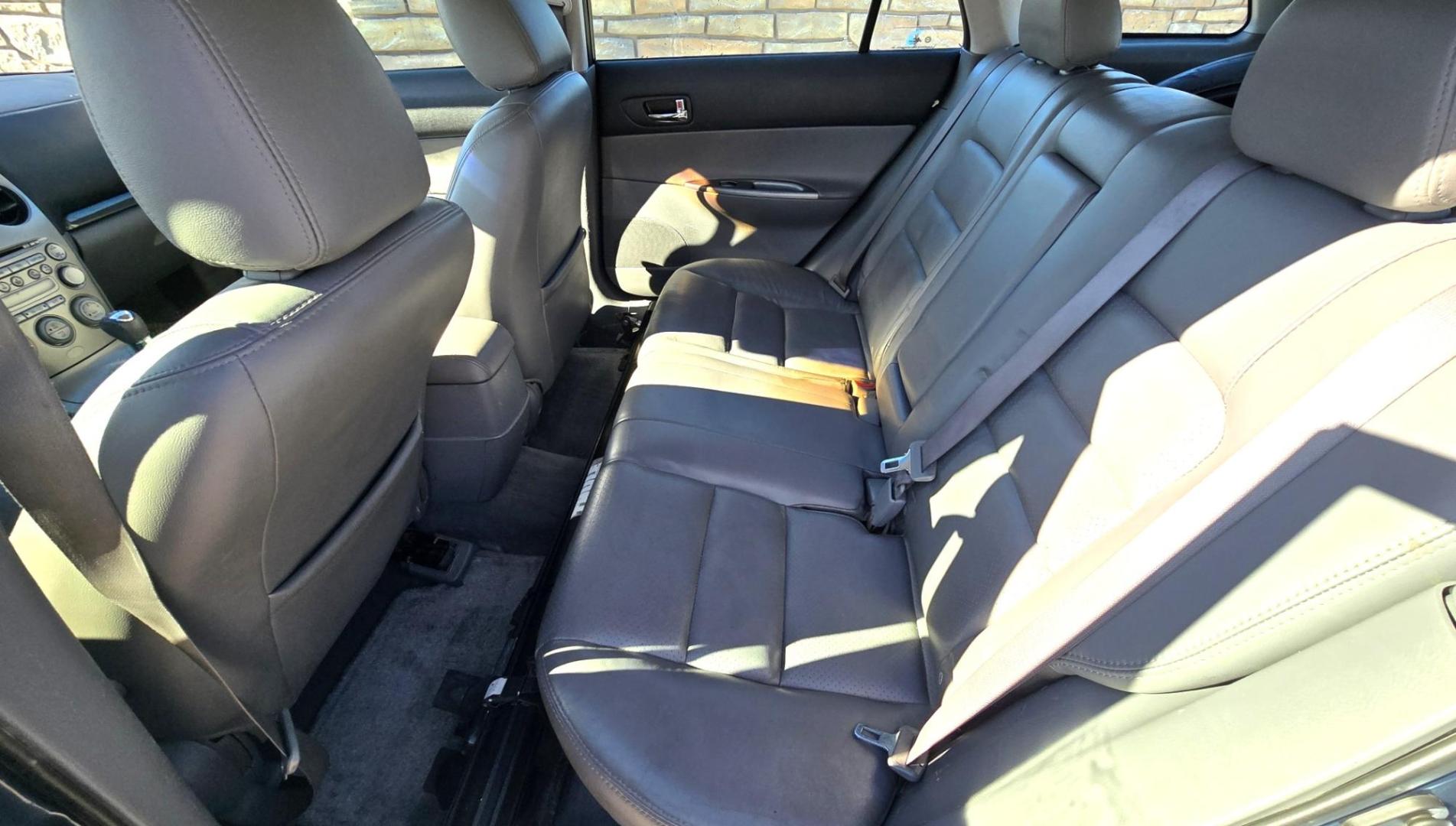 2004 Blue /Tan Mazda MAZDA6 Sport Wagon s (1YVFP82D245) with an 3.0L V6 DOHC 24V engine, 5 Speed Manual transmission, located at 450 N Russell, Missoula, MT, 59801, (406) 543-6600, 46.874496, -114.017433 - Super Clean FWD Wagon. One Owner. Clean Carfax and only 78K Miles. 3.0L V6 Engine. 5 Speed Manual Transmission. Air. Cruise. Tilt. Power Windows and Locks. AM FM CD Player.Power Drivers Seat. Has like New Bridgestone Radials on it and comes with Snow Tires on wheels. Paint is Excellent and Car runs - Photo#8