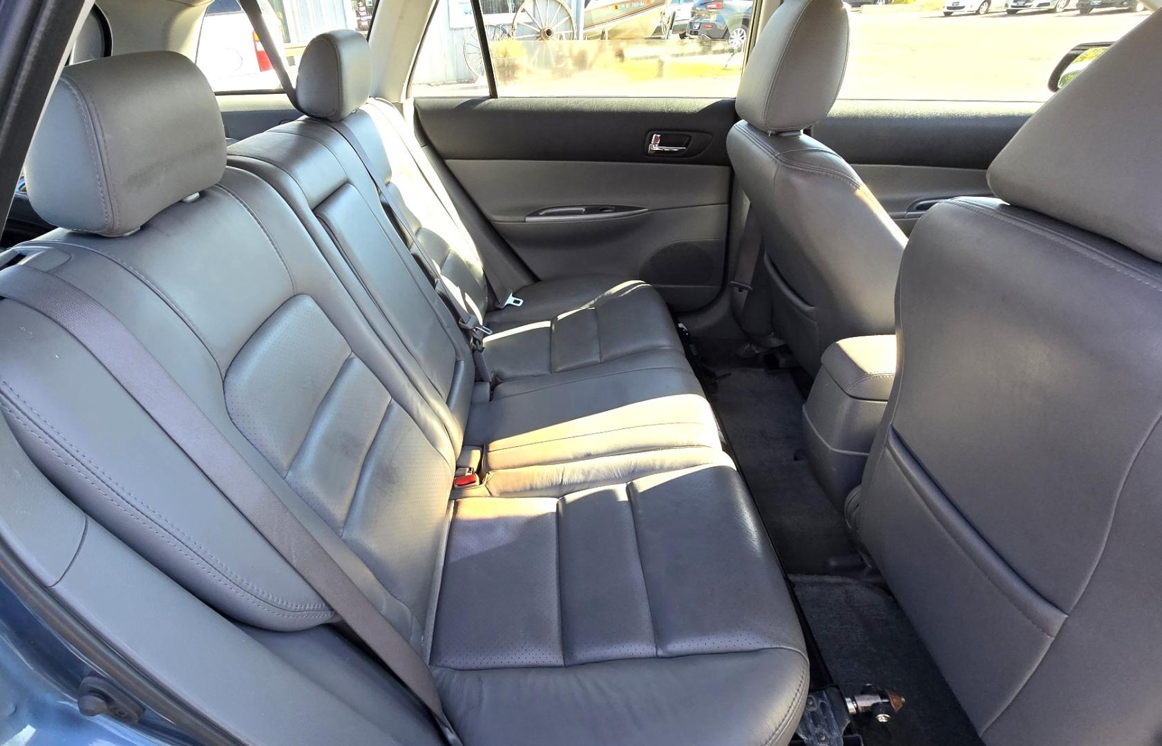 2004 Blue /Tan Mazda MAZDA6 Sport Wagon s (1YVFP82D245) with an 3.0L V6 DOHC 24V engine, 5 Speed Manual transmission, located at 450 N Russell, Missoula, MT, 59801, (406) 543-6600, 46.874496, -114.017433 - Super Clean FWD Wagon. One Owner. Clean Carfax and only 78K Miles. 3.0L V6 Engine. 5 Speed Manual Transmission. Air. Cruise. Tilt. Power Windows and Locks. AM FM CD Player.Power Drivers Seat. Has like New Bridgestone Radials on it and comes with Snow Tires on wheels. Paint is Excellent and Car runs - Photo#9