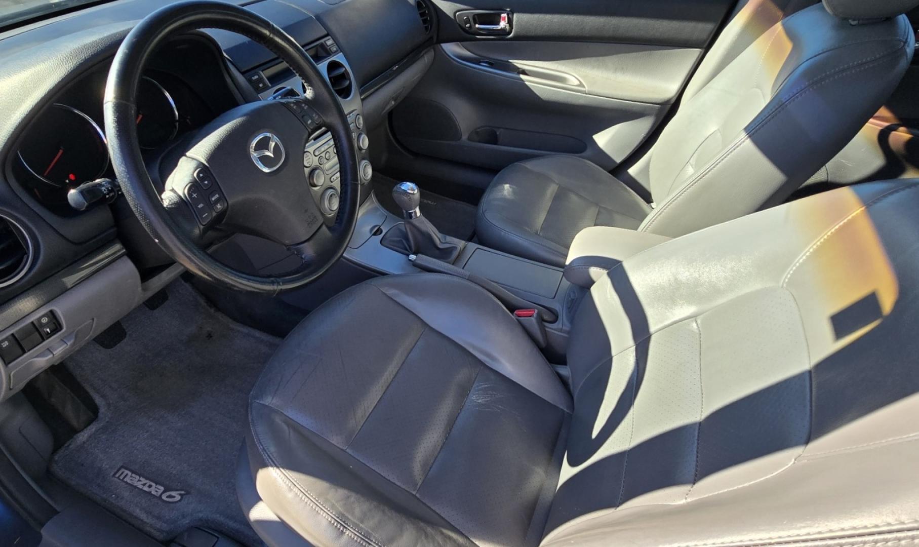 2004 Blue /Tan Mazda MAZDA6 Sport Wagon s (1YVFP82D245) with an 3.0L V6 DOHC 24V engine, 5 Speed Manual transmission, located at 450 N Russell, Missoula, MT, 59801, (406) 543-6600, 46.874496, -114.017433 - Super Clean FWD Wagon. One Owner. Clean Carfax and only 78K Miles. 3.0L V6 Engine. 5 Speed Manual Transmission. Air. Cruise. Tilt. Power Windows and Locks. AM FM CD Player.Power Drivers Seat. Has like New Bridgestone Radials on it and comes with Snow Tires on wheels. Paint is Excellent and Car runs - Photo#12