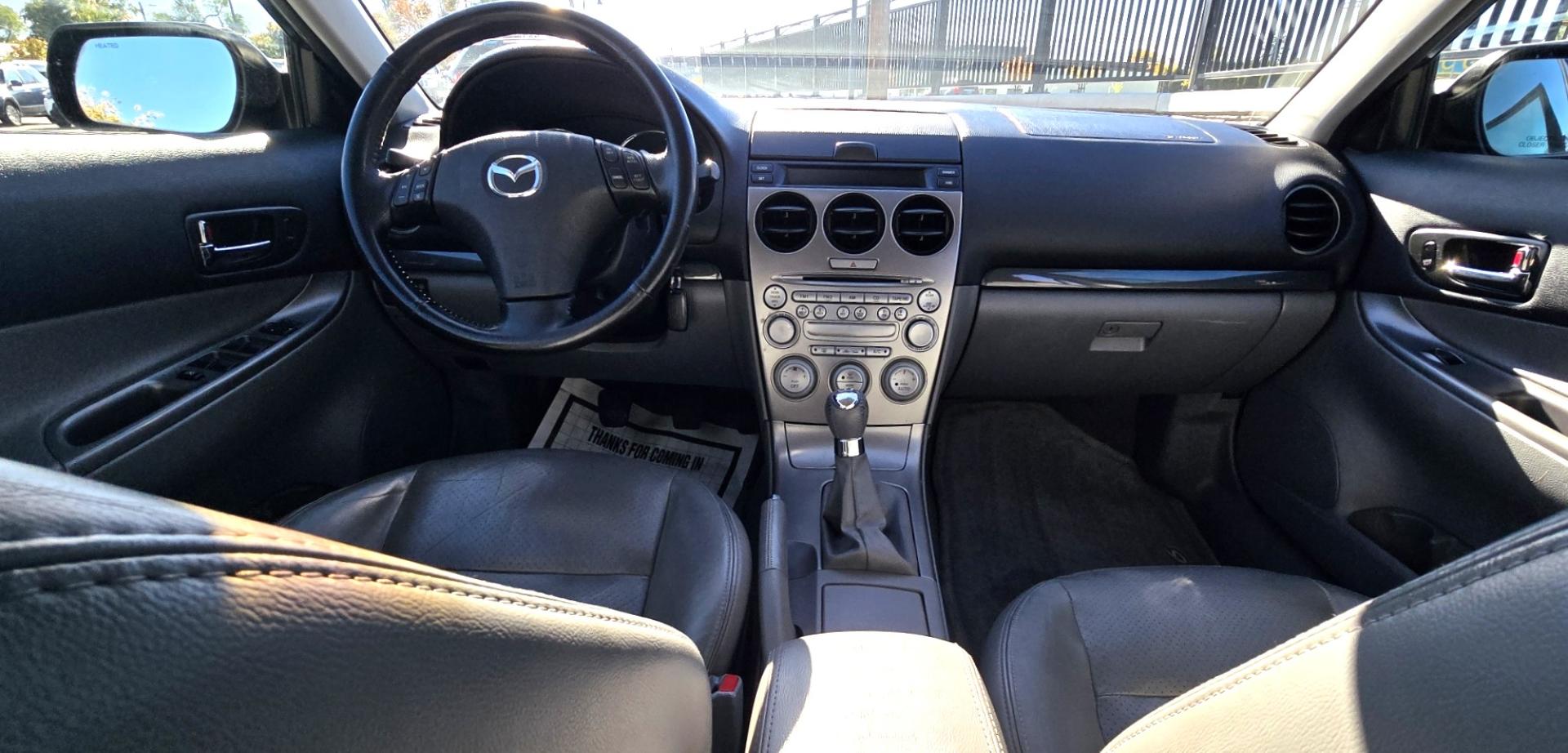 2004 Blue /Tan Mazda MAZDA6 Sport Wagon s (1YVFP82D245) with an 3.0L V6 DOHC 24V engine, 5 Speed Manual transmission, located at 450 N Russell, Missoula, MT, 59801, (406) 543-6600, 46.874496, -114.017433 - Super Clean FWD Wagon. One Owner. Clean Carfax and only 78K Miles. 3.0L V6 Engine. 5 Speed Manual Transmission. Air. Cruise. Tilt. Power Windows and Locks. AM FM CD Player.Power Drivers Seat. Has like New Bridgestone Radials on it and comes with Snow Tires on wheels. Paint is Excellent and Car runs - Photo#11