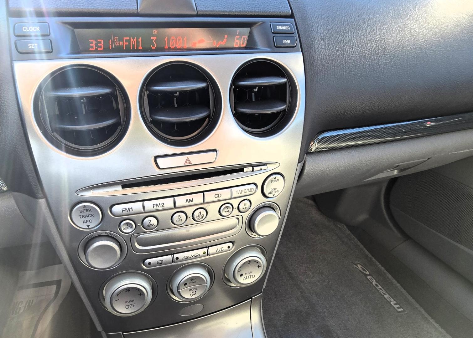 2004 Blue /Tan Mazda MAZDA6 Sport Wagon s (1YVFP82D245) with an 3.0L V6 DOHC 24V engine, 5 Speed Manual transmission, located at 450 N Russell, Missoula, MT, 59801, (406) 543-6600, 46.874496, -114.017433 - Super Clean FWD Wagon. One Owner. Clean Carfax and only 78K Miles. 3.0L V6 Engine. 5 Speed Manual Transmission. Air. Cruise. Tilt. Power Windows and Locks. AM FM CD Player.Power Drivers Seat. Has like New Bridgestone Radials on it and comes with Snow Tires on wheels. Paint is Excellent and Car runs - Photo#13