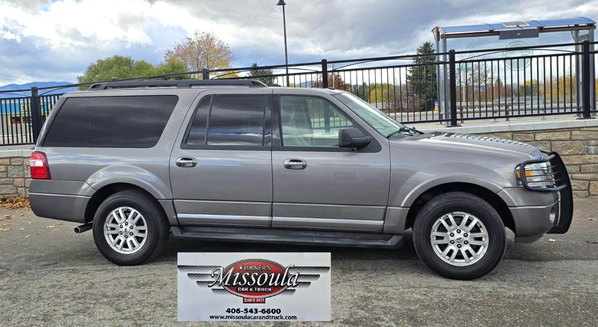 2011 Grey /Tan Ford Expedition EL XLT 4WD (1FMJK1J54BE) with an 5.4L V8 SOHC 16V FFV engine, 6-Speed Automatic transmission, located at 450 N Russell, Missoula, MT, 59801, (406) 543-6600, 46.874496, -114.017433 - Giant 4WD SUV. 5.4L V8 Engine. Automatic Transmission. 3rd Row Seating with Room to Spare. Front and Rear Climate Control. Air. Cruise. Tilt. Power Windows and Locks. AM FM CD Player. Bluetooth. Grill Guard. Running Boards. Like New Firestone Tires. Has a Sunroof but the glass does not open. We F - Photo#1