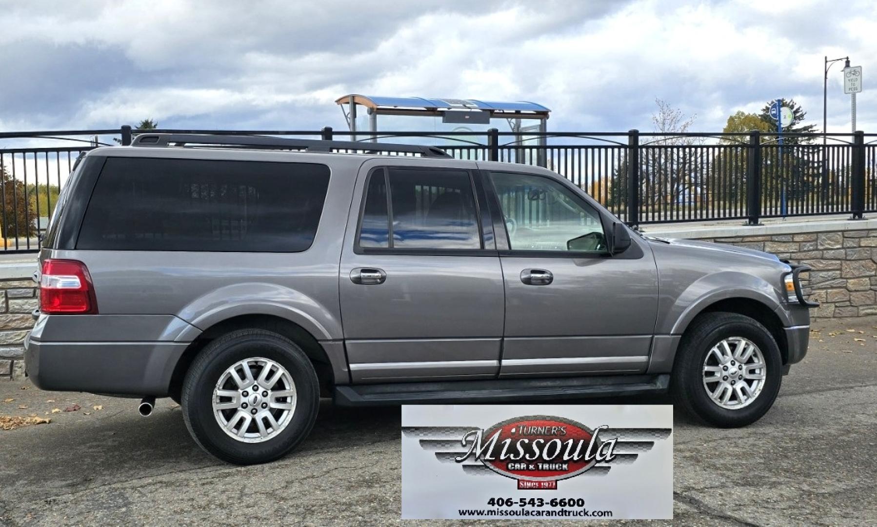 2011 Grey /Tan Ford Expedition EL XLT 4WD (1FMJK1J54BE) with an 5.4L V8 SOHC 16V FFV engine, 6-Speed Automatic transmission, located at 450 N Russell, Missoula, MT, 59801, (406) 543-6600, 46.874496, -114.017433 - Giant 4WD SUV. 5.4L V8 Engine. Automatic Transmission. 3rd Row Seating with Room to Spare. Front and Rear Climate Control. Air. Cruise. Tilt. Power Windows and Locks. AM FM CD Player. Bluetooth. Grill Guard. Running Boards. Like New Firestone Tires. Has a Sunroof but the glass does not open. We F - Photo#0