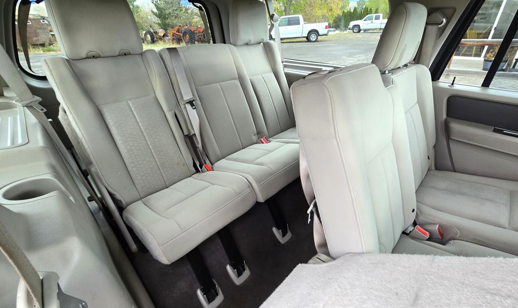 2011 Grey /Tan Ford Expedition EL XLT 4WD (1FMJK1J54BE) with an 5.4L V8 SOHC 16V FFV engine, 6-Speed Automatic transmission, located at 450 N Russell, Missoula, MT, 59801, (406) 543-6600, 46.874496, -114.017433 - Giant 4WD SUV. 5.4L V8 Engine. Automatic Transmission. 3rd Row Seating with Room to Spare. Front and Rear Climate Control. Air. Cruise. Tilt. Power Windows and Locks. AM FM CD Player. Bluetooth. Grill Guard. Running Boards. Like New Firestone Tires. Has a Sunroof but the glass does not open. We F - Photo#11