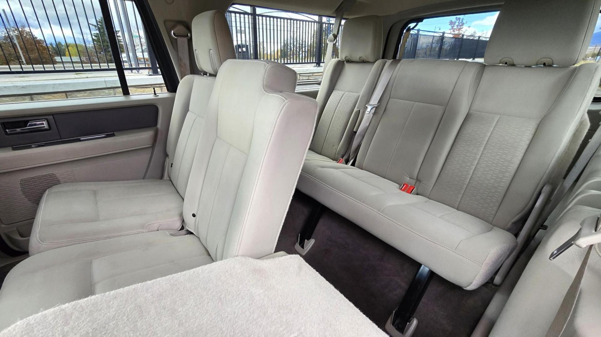 2011 Grey /Tan Ford Expedition EL XLT 4WD (1FMJK1J54BE) with an 5.4L V8 SOHC 16V FFV engine, 6-Speed Automatic transmission, located at 450 N Russell, Missoula, MT, 59801, (406) 543-6600, 46.874496, -114.017433 - Giant 4WD SUV. 5.4L V8 Engine. Automatic Transmission. 3rd Row Seating with Room to Spare. Front and Rear Climate Control. Air. Cruise. Tilt. Power Windows and Locks. AM FM CD Player. Bluetooth. Grill Guard. Running Boards. Like New Firestone Tires. Has a Sunroof but the glass does not open. We F - Photo#13