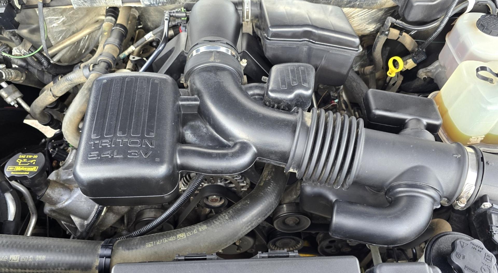 2011 Grey /Tan Ford Expedition EL XLT 4WD (1FMJK1J54BE) with an 5.4L V8 SOHC 16V FFV engine, 6-Speed Automatic transmission, located at 450 N Russell, Missoula, MT, 59801, (406) 543-6600, 46.874496, -114.017433 - Giant 4WD SUV. 5.4L V8 Engine. Automatic Transmission. 3rd Row Seating with Room to Spare. Front and Rear Climate Control. Air. Cruise. Tilt. Power Windows and Locks. AM FM CD Player. Bluetooth. Grill Guard. Running Boards. Like New Firestone Tires. Has a Sunroof but the glass does not open. We F - Photo#18