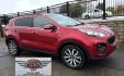2018 Red /Tan Kia Sportage EX AWD (KNDPNCAC8J7) with an 2.4L V6 DOHC 24V engine, 6A transmission, located at 450 N Russell, Missoula, MT, 59801, (406) 543-6600, 46.874496, -114.017433 - Cute Little AWD SUV that has more features than you can shake a stick at, 2.4L I4 Engine. 6 Speed Automatic Transmission. Technology Package. Huge Panoramic Sun Roof. Navigation. Heated and Cooled Front Seats. Heated Steering Wheel. Heated Back Seats. Driver Assist. Backup Camera. Bluetooth Audio an - Photo#1