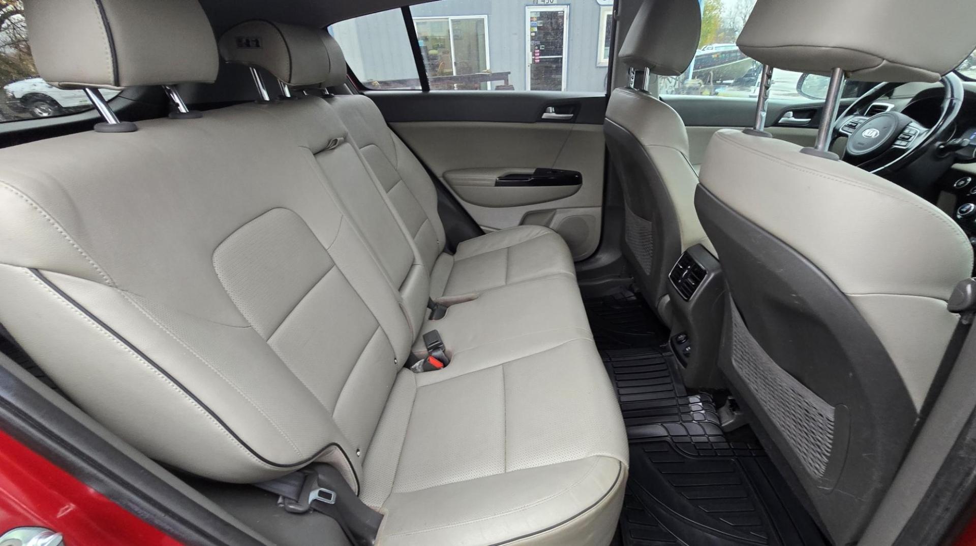 2018 Red /Tan Kia Sportage EX AWD (KNDPNCAC8J7) with an 2.4L V6 DOHC 24V engine, 6A transmission, located at 450 N Russell, Missoula, MT, 59801, (406) 543-6600, 46.874496, -114.017433 - Cute Little AWD SUV that has more features than you can shake a stick at, 2.4L I4 Engine. 6 Speed Automatic Transmission. Technology Package. Huge Panoramic Sun Roof. Navigation. Heated and Cooled Front Seats. Heated Steering Wheel. Heated Back Seats. Driver Assist. Backup Camera. Bluetooth Audio an - Photo#11