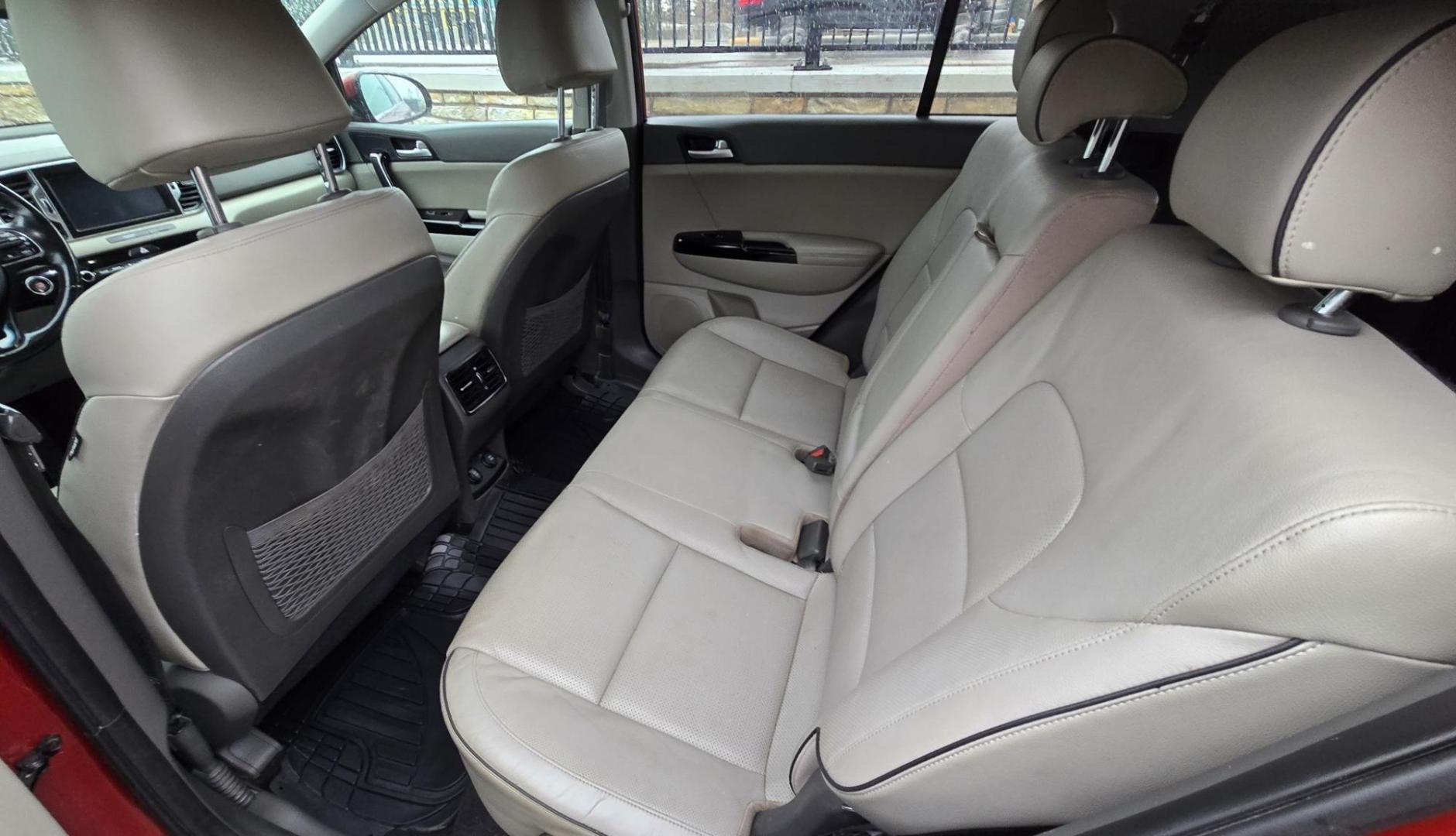 2018 Red /Tan Kia Sportage EX AWD (KNDPNCAC8J7) with an 2.4L V6 DOHC 24V engine, 6A transmission, located at 450 N Russell, Missoula, MT, 59801, (406) 543-6600, 46.874496, -114.017433 - Cute Little AWD SUV that has more features than you can shake a stick at, 2.4L I4 Engine. 6 Speed Automatic Transmission. Technology Package. Huge Panoramic Sun Roof. Navigation. Heated and Cooled Front Seats. Heated Steering Wheel. Heated Back Seats. Driver Assist. Backup Camera. Bluetooth Audio an - Photo#13