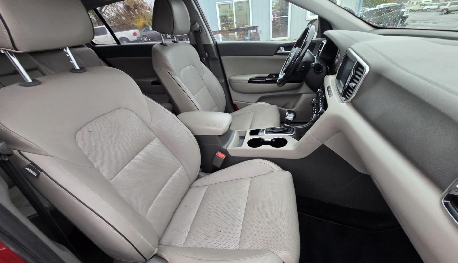 2018 Red /Tan Kia Sportage EX AWD (KNDPNCAC8J7) with an 2.4L V6 DOHC 24V engine, 6A transmission, located at 450 N Russell, Missoula, MT, 59801, (406) 543-6600, 46.874496, -114.017433 - Cute Little AWD SUV that has more features than you can shake a stick at, 2.4L I4 Engine. 6 Speed Automatic Transmission. Technology Package. Huge Panoramic Sun Roof. Navigation. Heated and Cooled Front Seats. Heated Steering Wheel. Heated Back Seats. Driver Assist. Backup Camera. Bluetooth Audio an - Photo#12