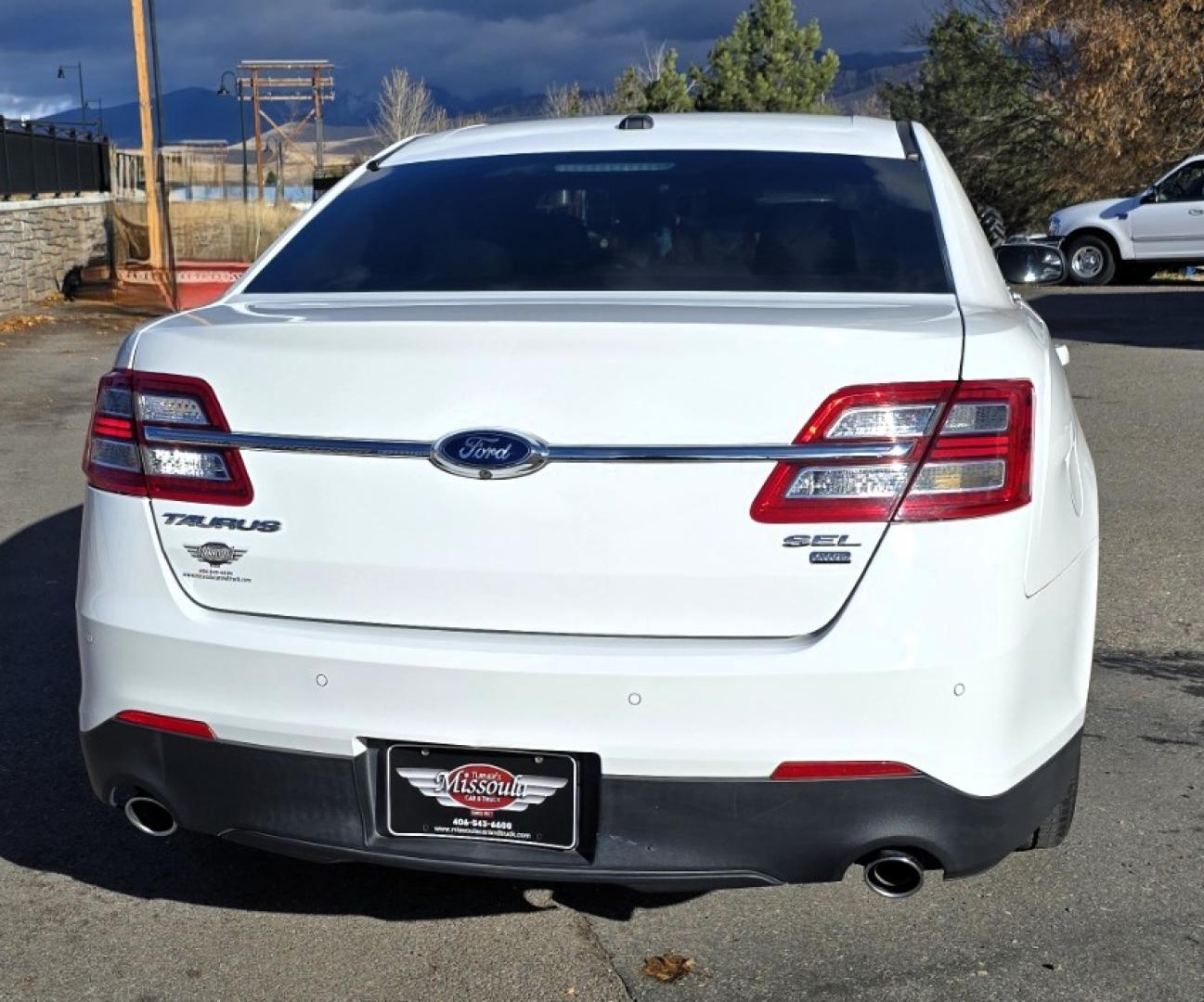 2016 White /Tan Ford Taurus SEL AWD (1FAHP2H83GG) with an 3.5L V6 DOHC 24V engine, 6A transmission, located at 450 N Russell, Missoula, MT, 59801, (406) 543-6600, 46.874496, -114.017433 - Classy Looking AWD Sedan. Peppy 3.5L V6 Engine. 6 Speed Automatic Transmission. Front Power Seats. Air. Cruise. Tilt. AM FM SAT CD. Bluetooth Audio and Phone. Power Windows and Locks. Goodyear Tires. Remote Start. We Finance through local Credit Unions. We do NOT offer In House (Buy Here Pay Her - Photo#6