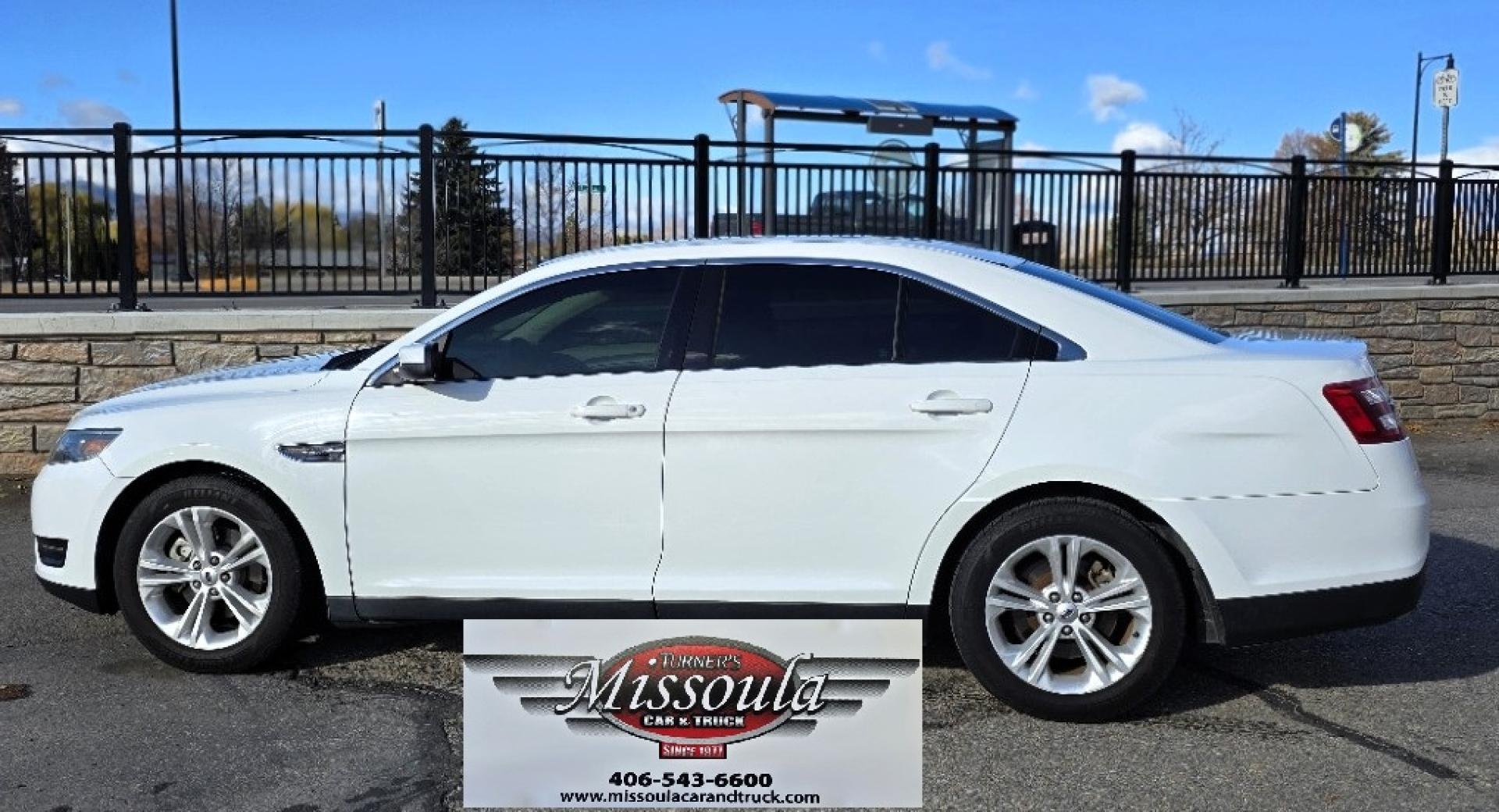 2016 White /Tan Ford Taurus SEL AWD (1FAHP2H83GG) with an 3.5L V6 DOHC 24V engine, 6A transmission, located at 450 N Russell, Missoula, MT, 59801, (406) 543-6600, 46.874496, -114.017433 - Classy Looking AWD Sedan. Peppy 3.5L V6 Engine. 6 Speed Automatic Transmission. Front Power Seats. Air. Cruise. Tilt. AM FM SAT CD. Bluetooth Audio and Phone. Power Windows and Locks. Goodyear Tires. Remote Start. We Finance through local Credit Unions. We do NOT offer In House (Buy Here Pay Her - Photo#1