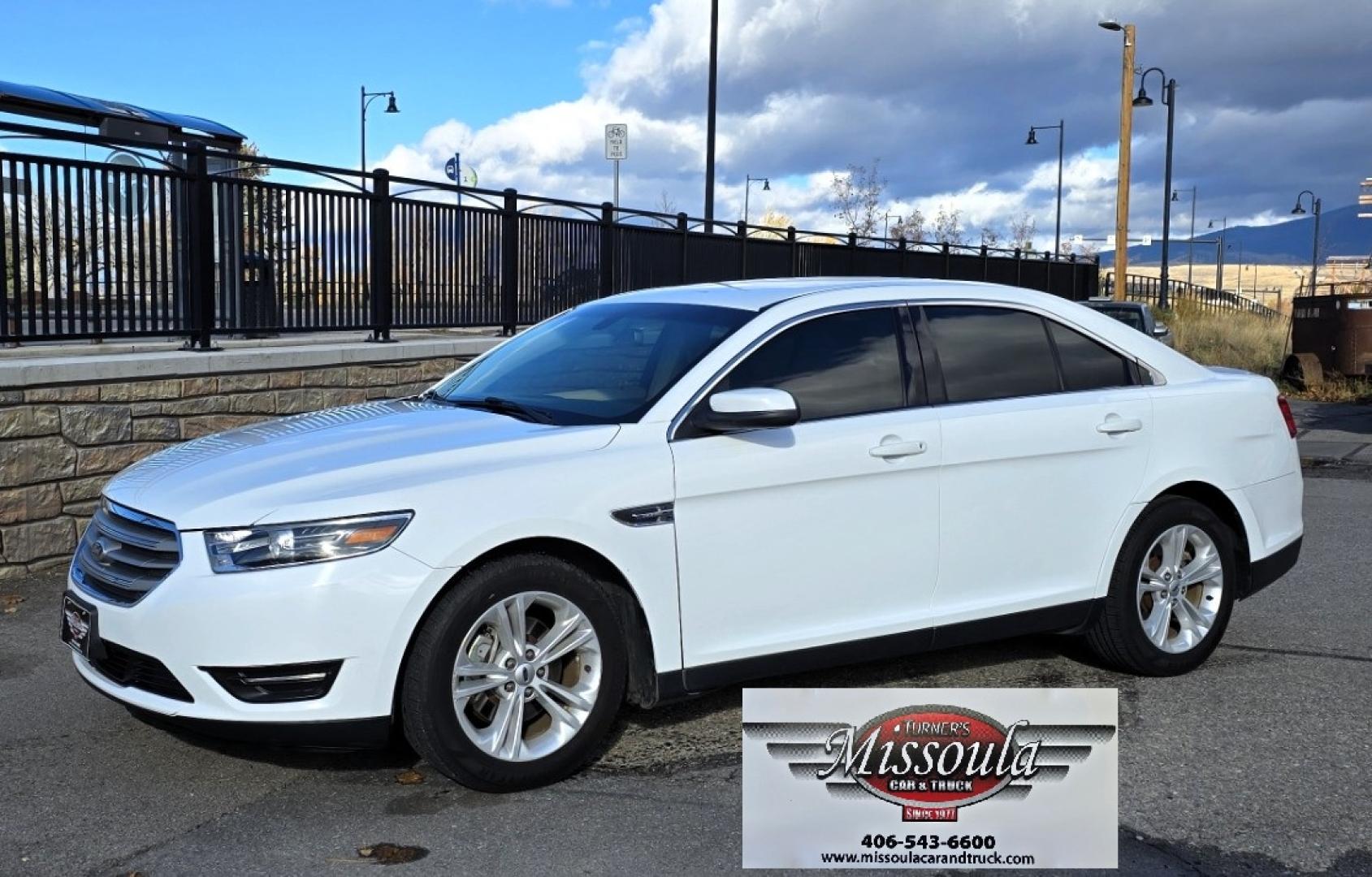 2016 White /Tan Ford Taurus SEL AWD (1FAHP2H83GG) with an 3.5L V6 DOHC 24V engine, 6A transmission, located at 450 N Russell, Missoula, MT, 59801, (406) 543-6600, 46.874496, -114.017433 - Classy Looking AWD Sedan. Peppy 3.5L V6 Engine. 6 Speed Automatic Transmission. Front Power Seats. Air. Cruise. Tilt. AM FM SAT CD. Bluetooth Audio and Phone. Power Windows and Locks. Goodyear Tires. Remote Start. We Finance through local Credit Unions. We do NOT offer In House (Buy Here Pay Her - Photo#2