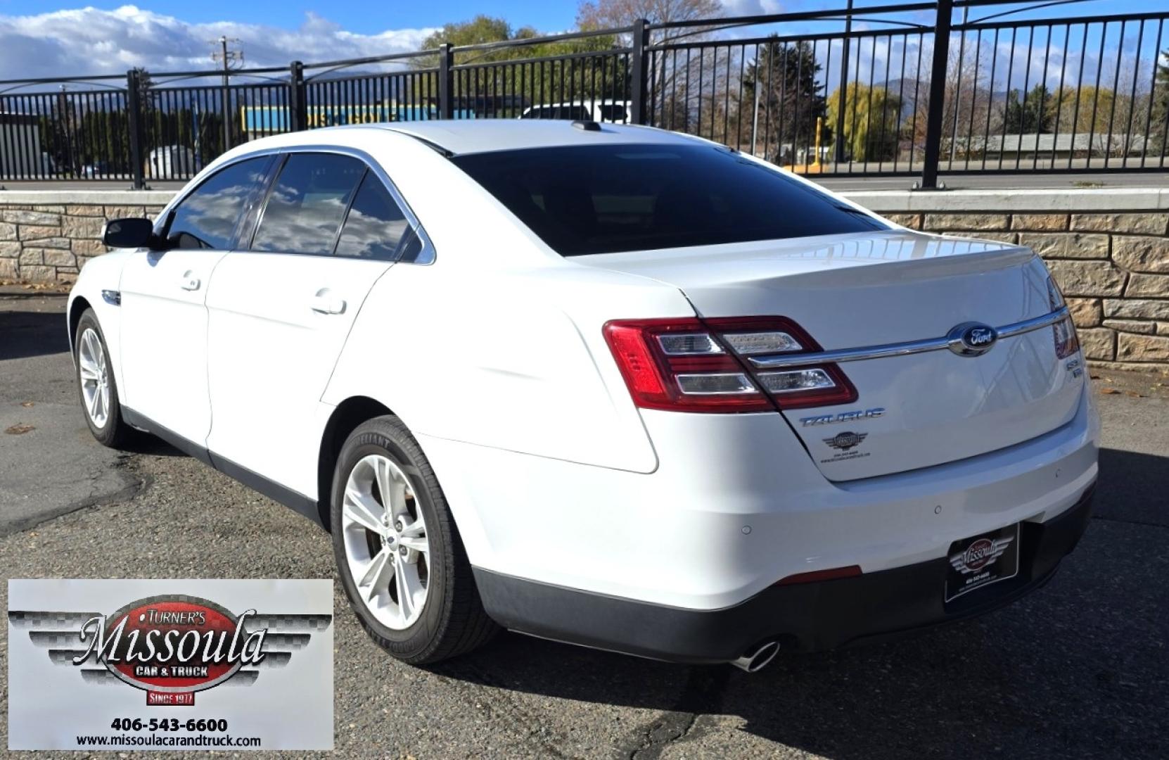 2016 White /Tan Ford Taurus SEL AWD (1FAHP2H83GG) with an 3.5L V6 DOHC 24V engine, 6A transmission, located at 450 N Russell, Missoula, MT, 59801, (406) 543-6600, 46.874496, -114.017433 - Classy Looking AWD Sedan. Peppy 3.5L V6 Engine. 6 Speed Automatic Transmission. Front Power Seats. Air. Cruise. Tilt. AM FM SAT CD. Bluetooth Audio and Phone. Power Windows and Locks. Goodyear Tires. Remote Start. We Finance through local Credit Unions. We do NOT offer In House (Buy Here Pay Her - Photo#9
