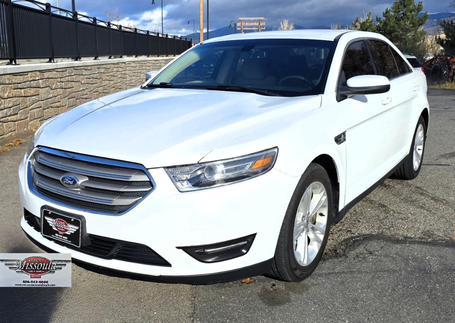 2016 White /Tan Ford Taurus SEL AWD (1FAHP2H83GG) with an 3.5L V6 DOHC 24V engine, 6A transmission, located at 450 N Russell, Missoula, MT, 59801, (406) 543-6600, 46.874496, -114.017433 - Classy Looking AWD Sedan. Peppy 3.5L V6 Engine. 6 Speed Automatic Transmission. Front Power Seats. Air. Cruise. Tilt. AM FM SAT CD. Bluetooth Audio and Phone. Power Windows and Locks. Goodyear Tires. Remote Start. We Finance through local Credit Unions. We do NOT offer In House (Buy Here Pay Her - Photo#3