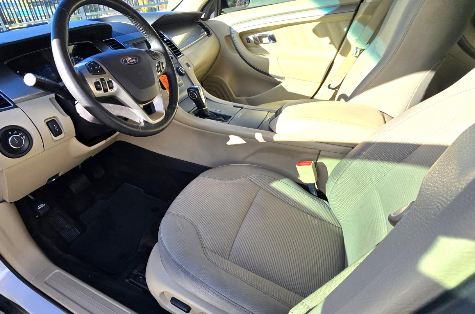 2016 White /Tan Ford Taurus SEL AWD (1FAHP2H83GG) with an 3.5L V6 DOHC 24V engine, 6A transmission, located at 450 N Russell, Missoula, MT, 59801, (406) 543-6600, 46.874496, -114.017433 - Classy Looking AWD Sedan. Peppy 3.5L V6 Engine. 6 Speed Automatic Transmission. Front Power Seats. Air. Cruise. Tilt. AM FM SAT CD. Bluetooth Audio and Phone. Power Windows and Locks. Goodyear Tires. Remote Start. We Finance through local Credit Unions. We do NOT offer In House (Buy Here Pay Her - Photo#13