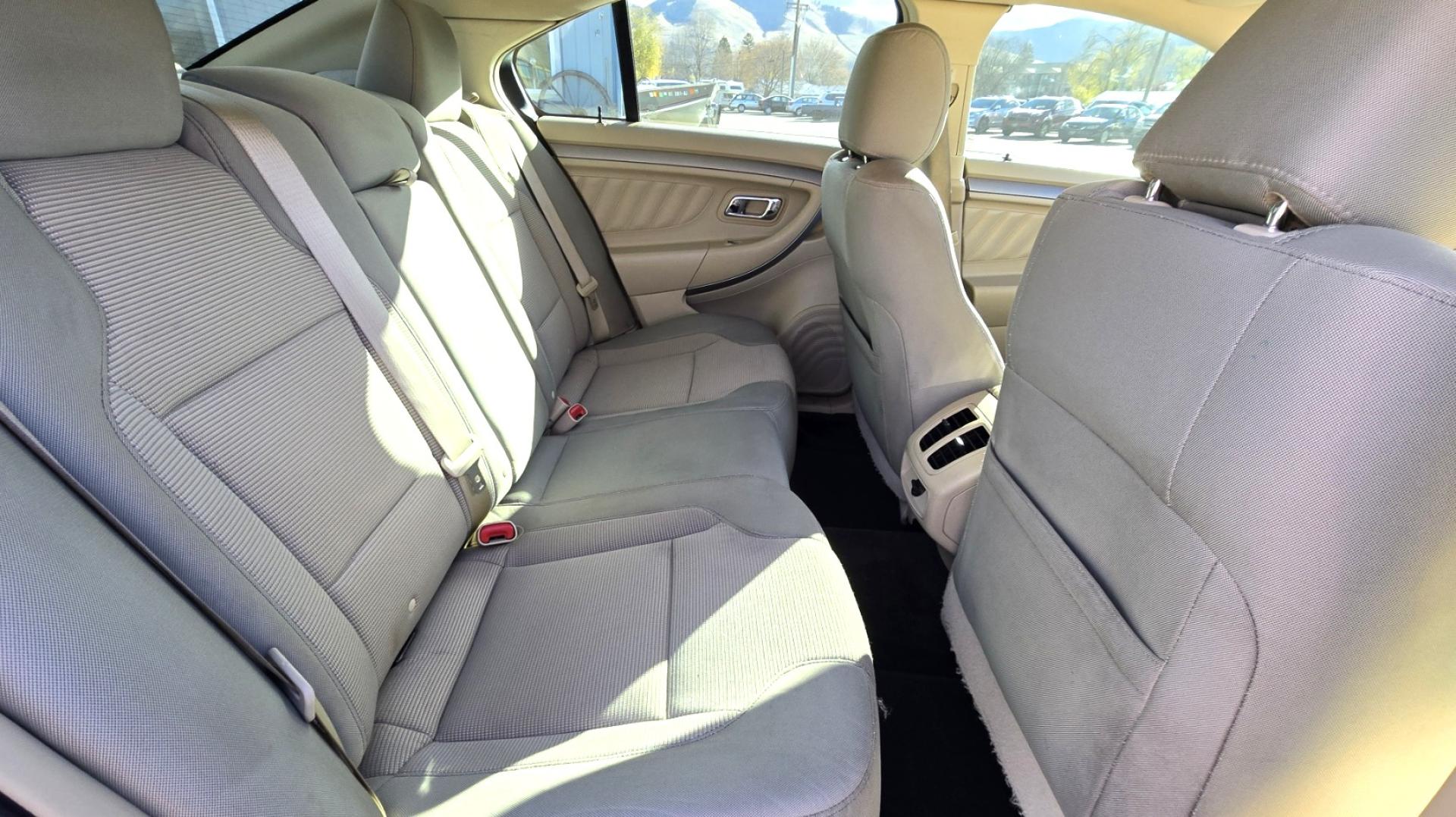 2016 White /Tan Ford Taurus SEL AWD (1FAHP2H83GG) with an 3.5L V6 DOHC 24V engine, 6A transmission, located at 450 N Russell, Missoula, MT, 59801, (406) 543-6600, 46.874496, -114.017433 - Classy Looking AWD Sedan. Peppy 3.5L V6 Engine. 6 Speed Automatic Transmission. Front Power Seats. Air. Cruise. Tilt. AM FM SAT CD. Bluetooth Audio and Phone. Power Windows and Locks. Goodyear Tires. Remote Start. We Finance through local Credit Unions. We do NOT offer In House (Buy Here Pay Her - Photo#11